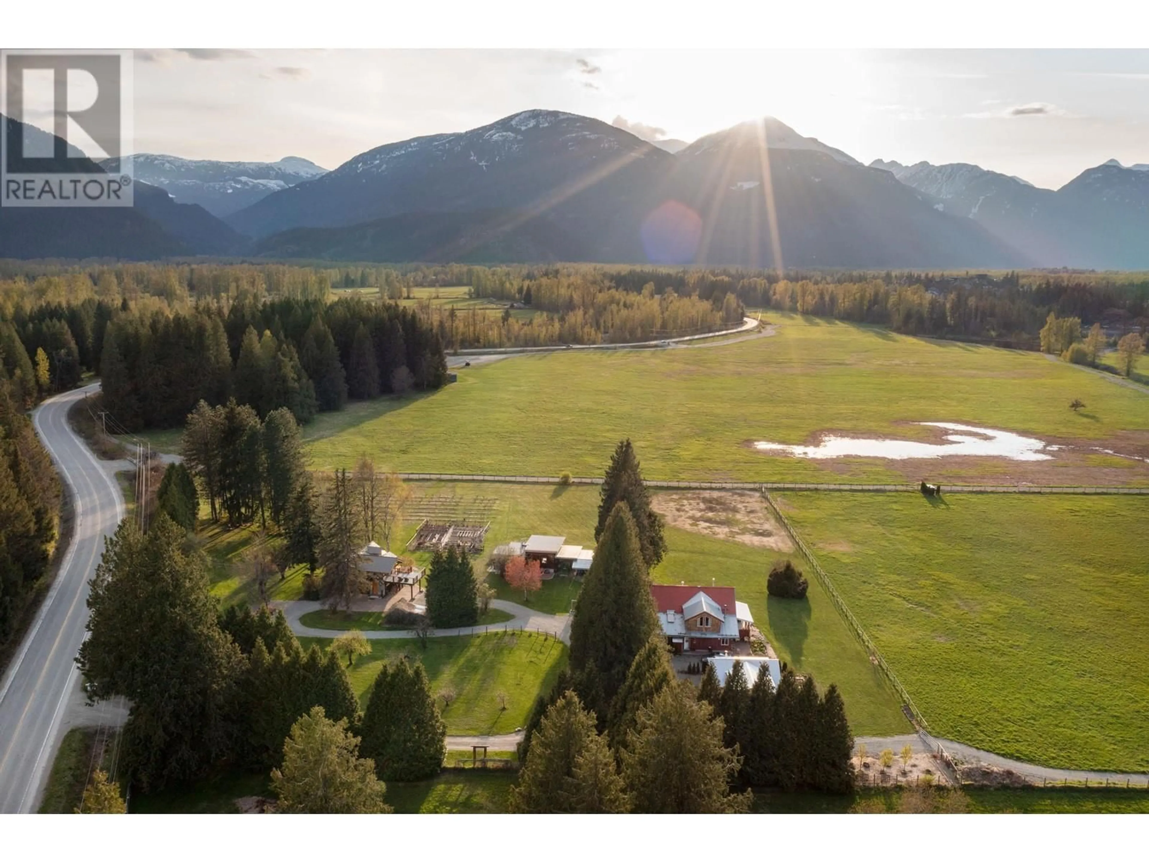 A pic from outside/outdoor area/front of a property/back of a property/a pic from drone, mountain view for 1865 HIGHWAY 99, Pemberton British Columbia V0N2L1