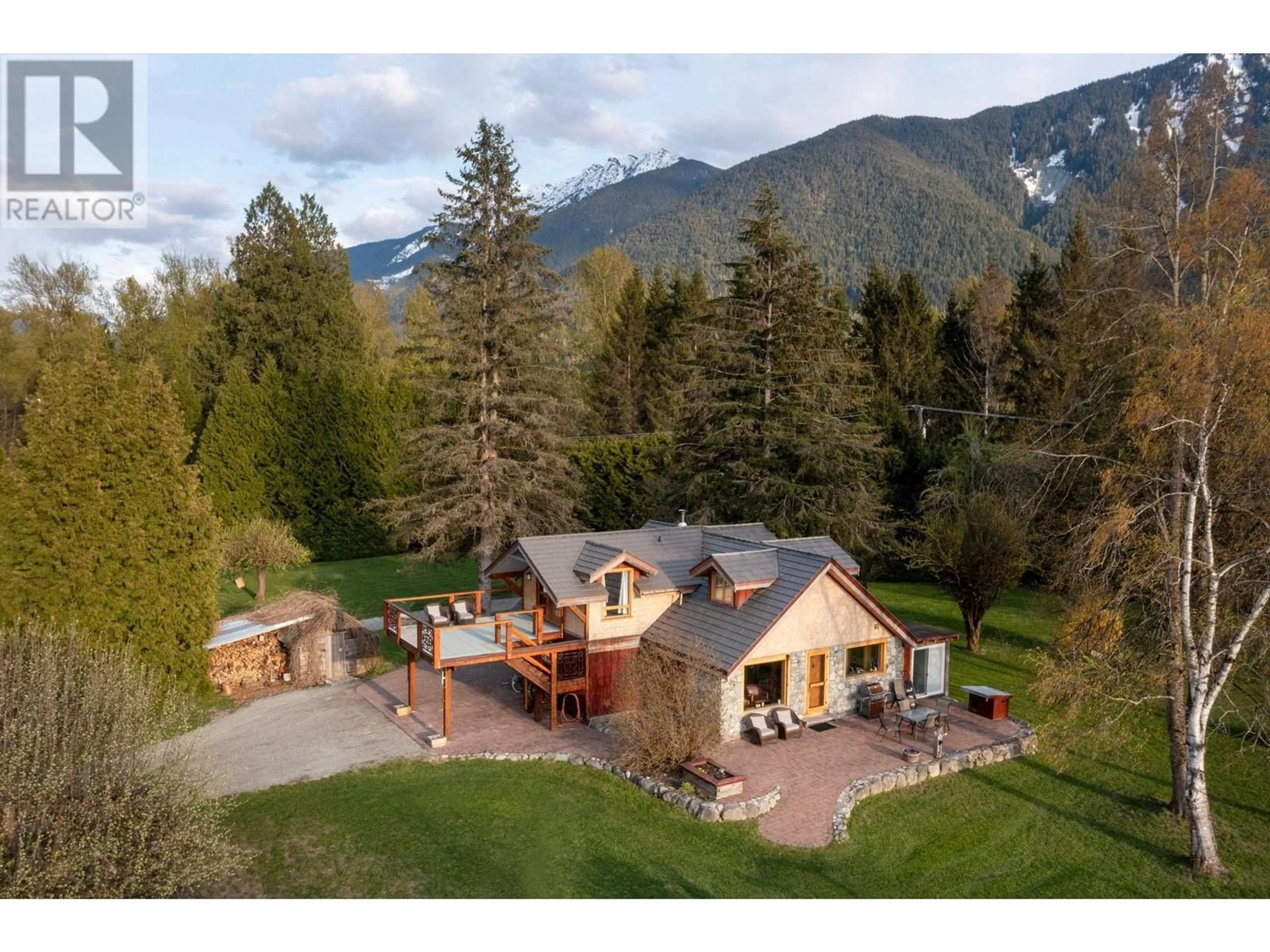 A pic from outside/outdoor area/front of a property/back of a property/a pic from drone, mountain view for 1865 HIGHWAY 99, Pemberton British Columbia V0N2L1