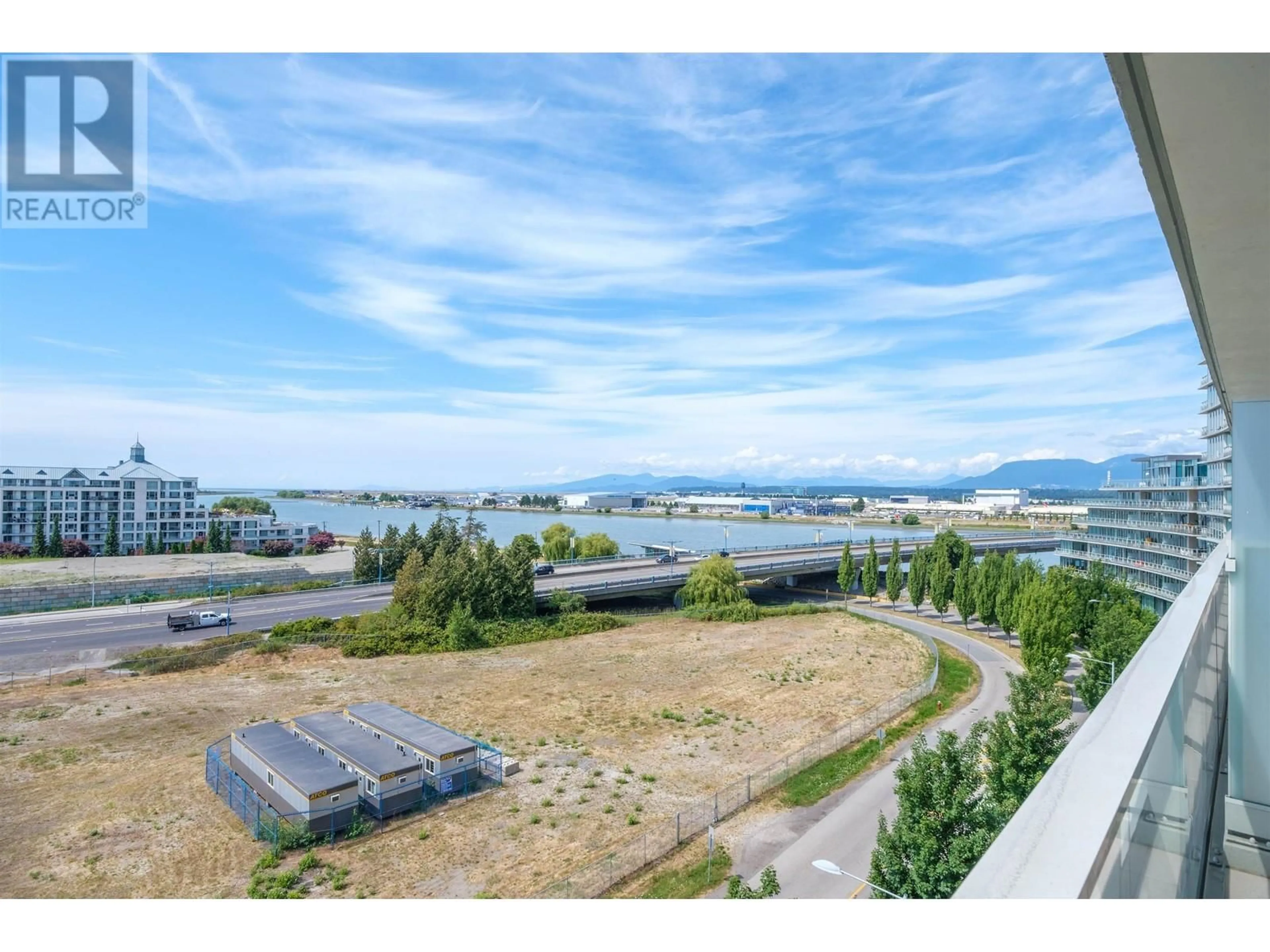 A pic from outside/outdoor area/front of a property/back of a property/a pic from drone, mountain view for 710 5177 BRIGHOUSE WAY, Richmond British Columbia V7C0A7