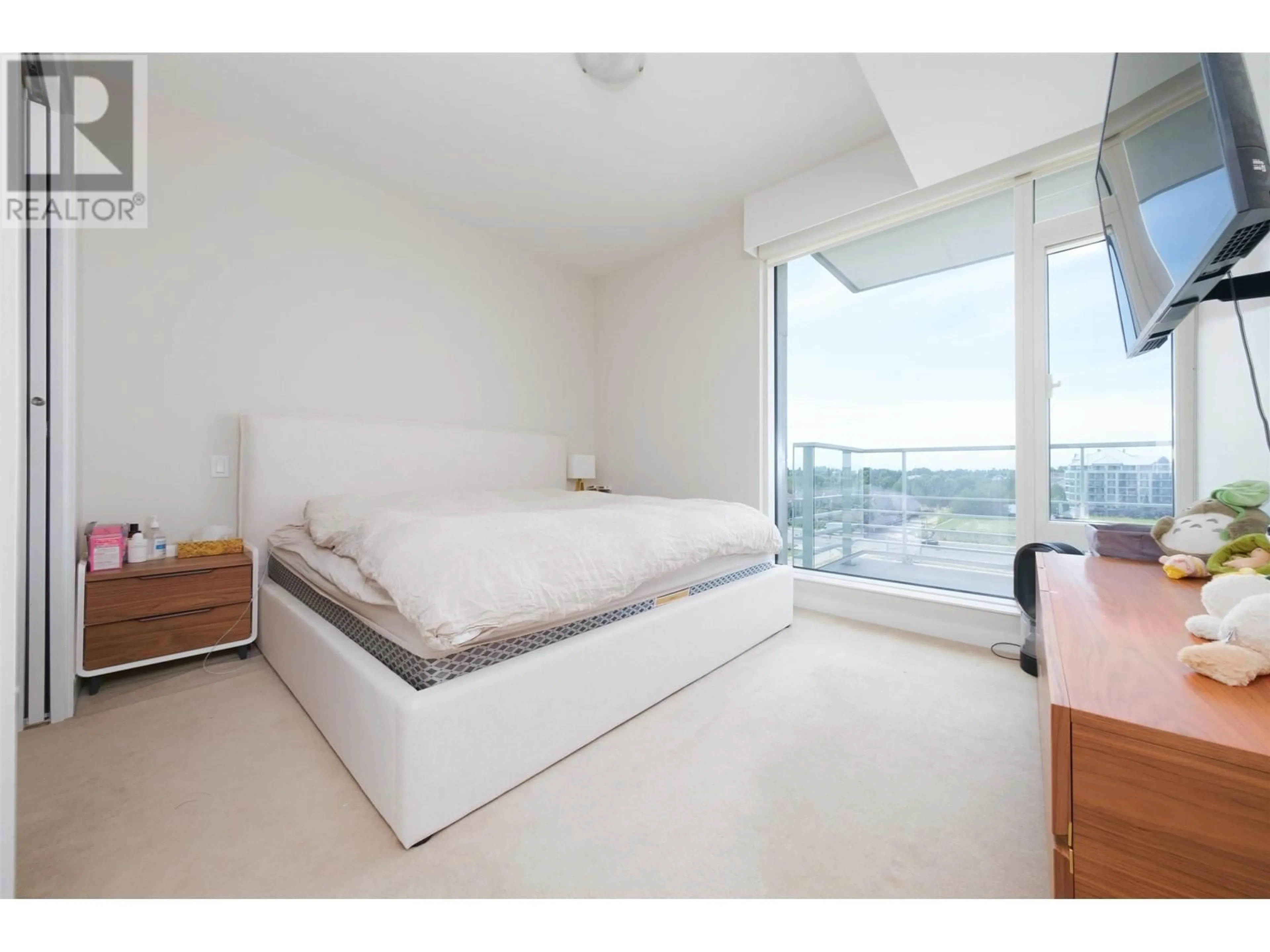 Bedroom with bed, unknown for 710 5177 BRIGHOUSE WAY, Richmond British Columbia V7C0A7