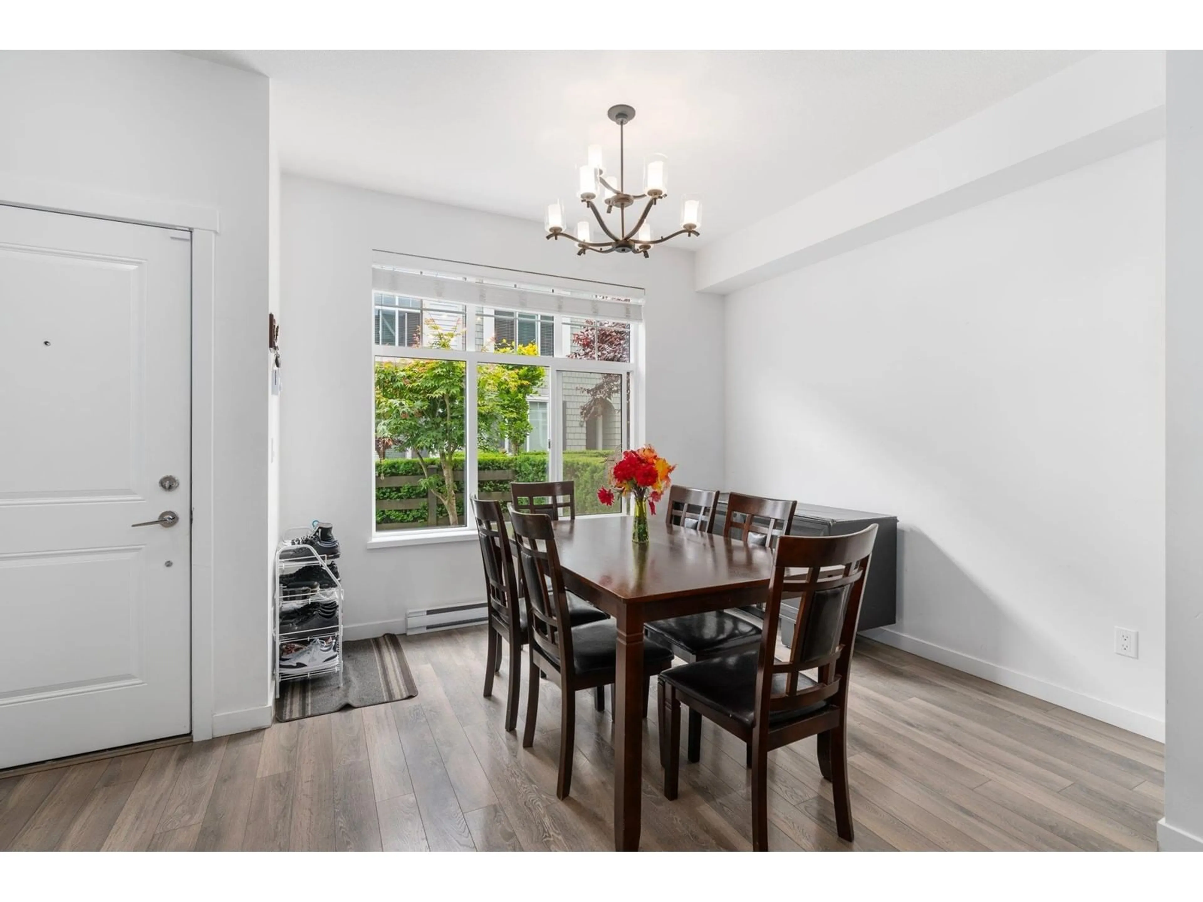 Dining room, wood/laminate floor for 52 8130 136A STREET, Surrey British Columbia V3W1H9