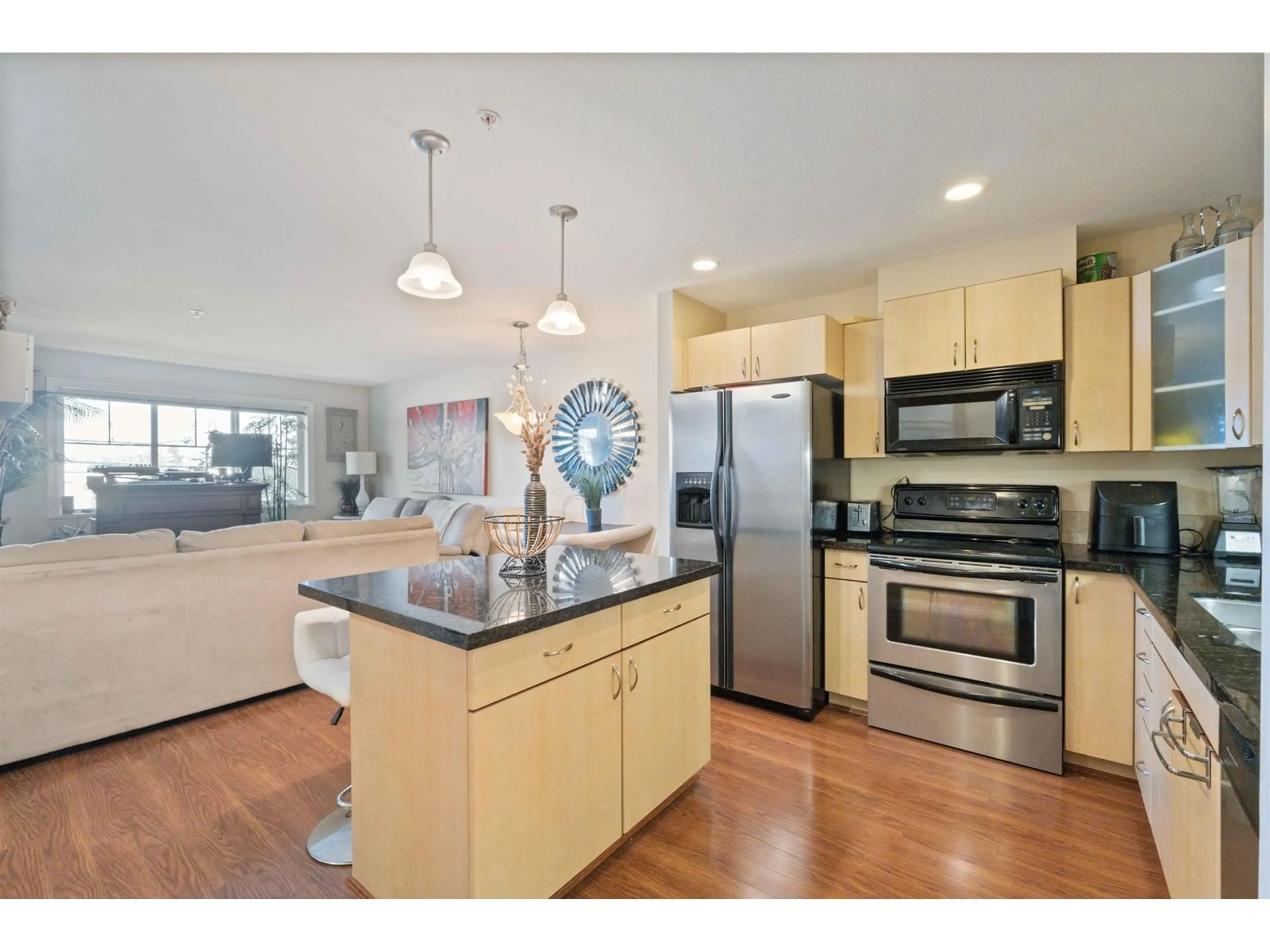 Open concept kitchen, unknown for 204 19774 56 AVENUE, Langley British Columbia V3A3X6