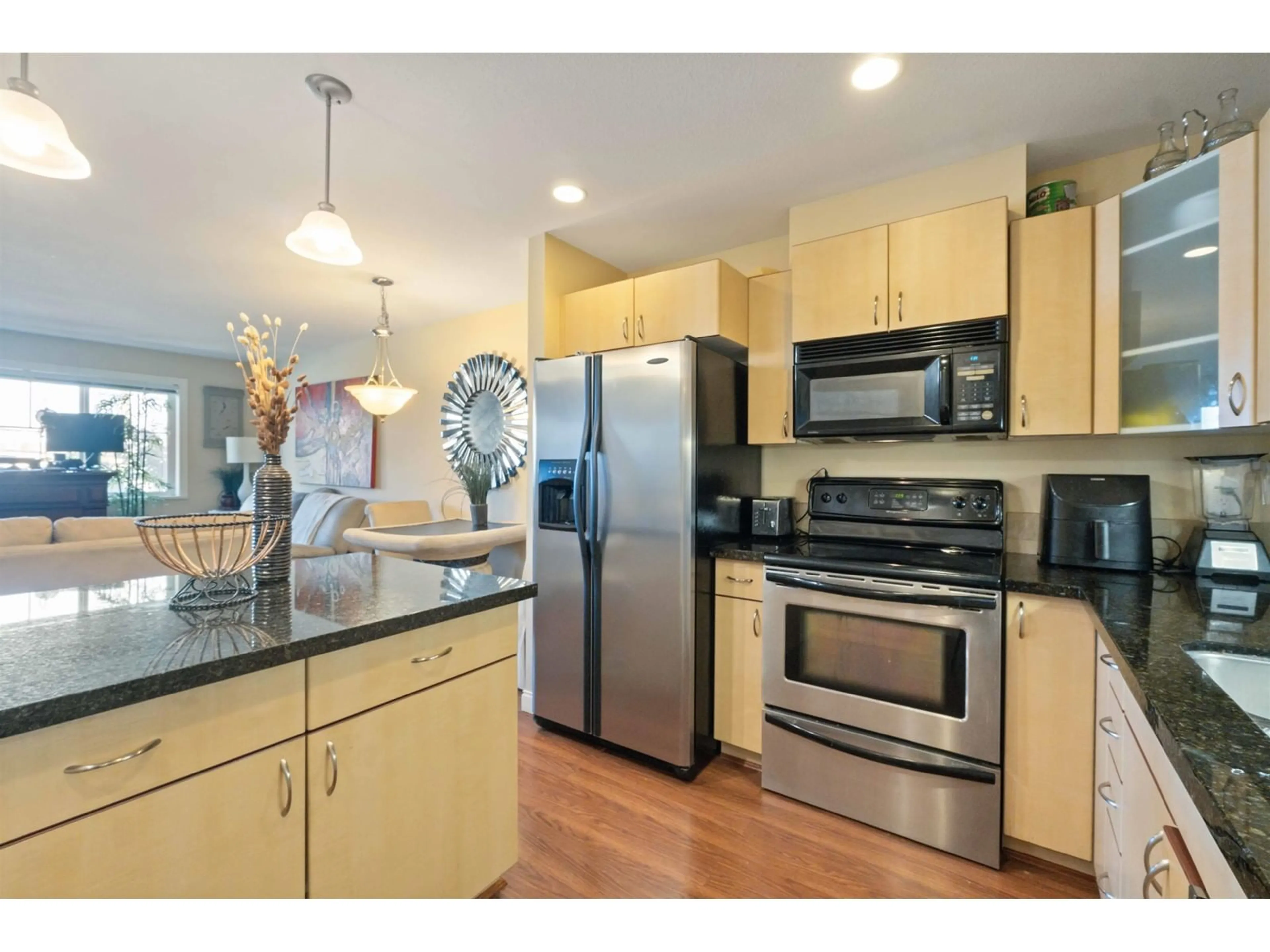 Open concept kitchen, unknown for 204 19774 56 AVENUE, Langley British Columbia V3A3X6