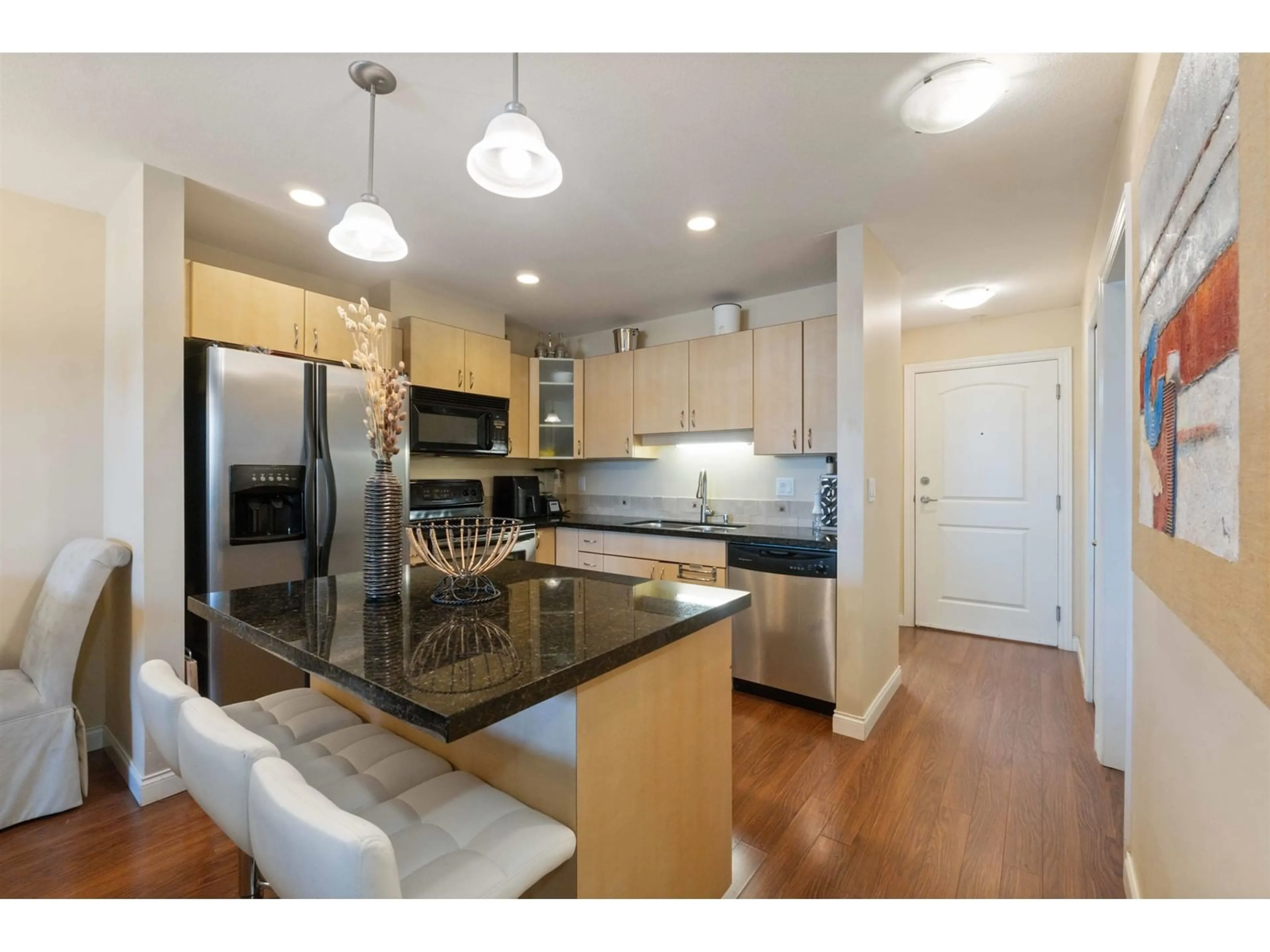 Open concept kitchen, unknown for 204 19774 56 AVENUE, Langley British Columbia V3A3X6