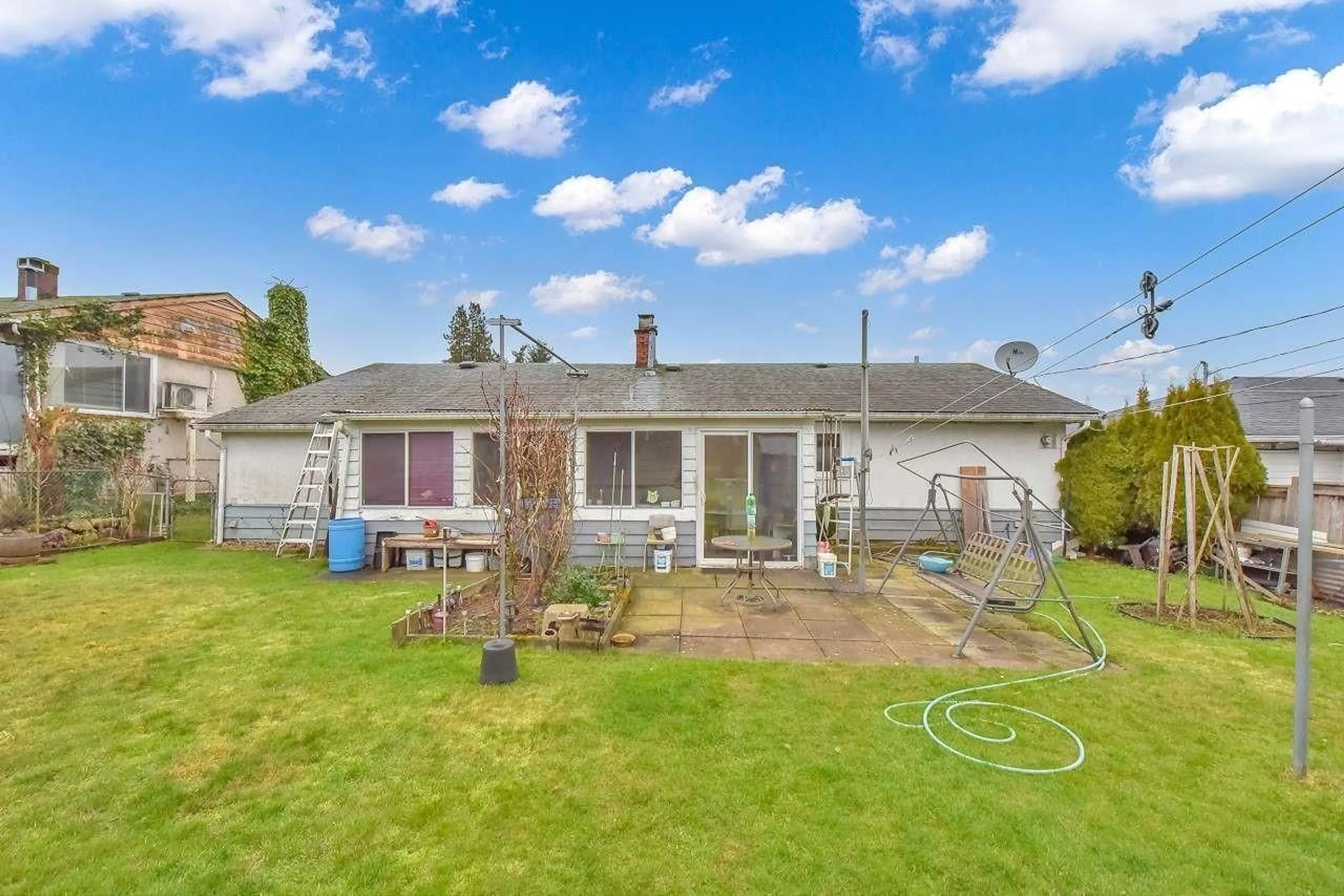 A pic from outside/outdoor area/front of a property/back of a property/a pic from drone, unknown for 11102 135A, Surrey British Columbia V3R3A4