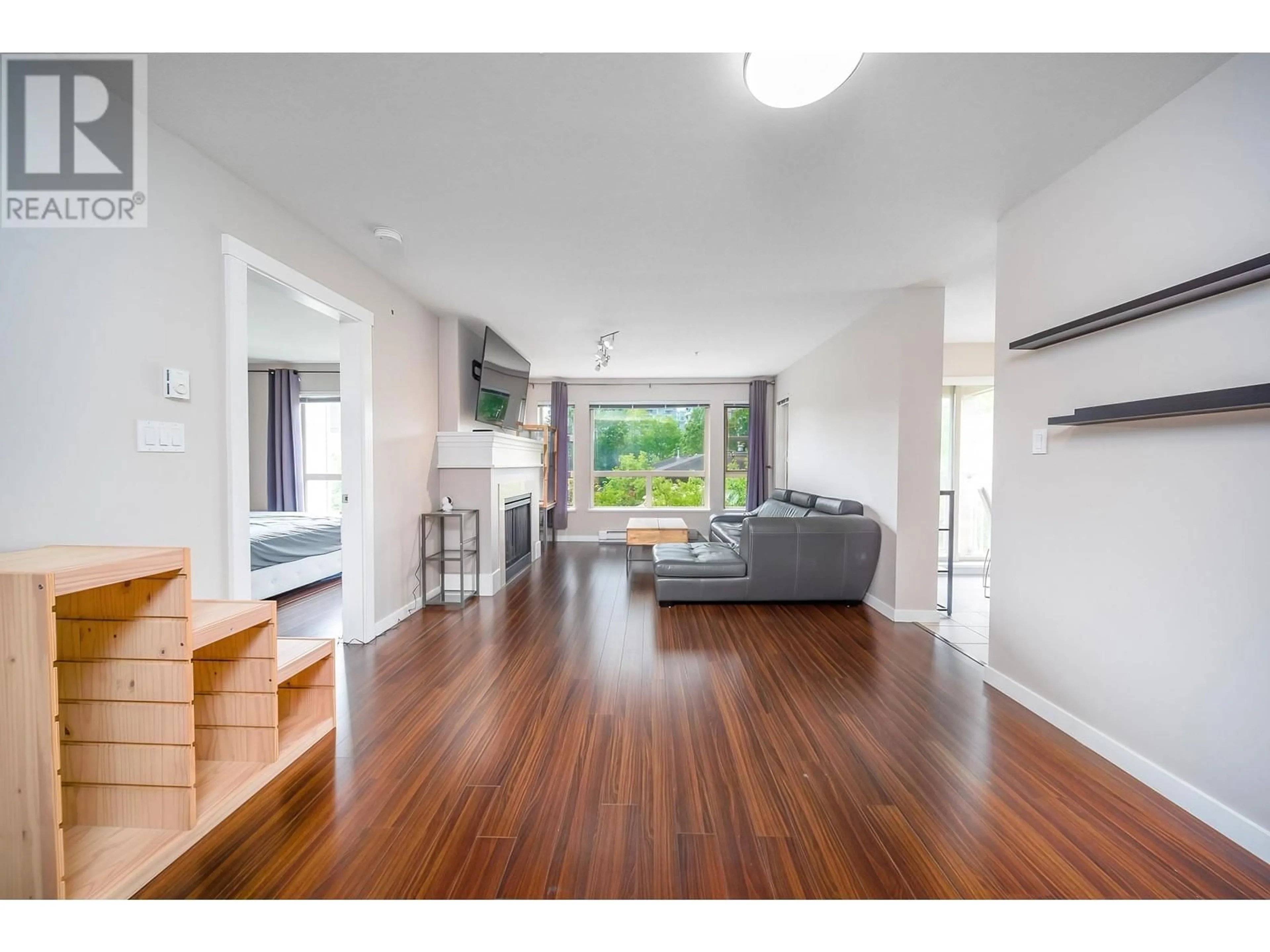 Living room with furniture, wood/laminate floor for 1321 5115 GARDEN CITY ROAD, Richmond British Columbia V6X4H6