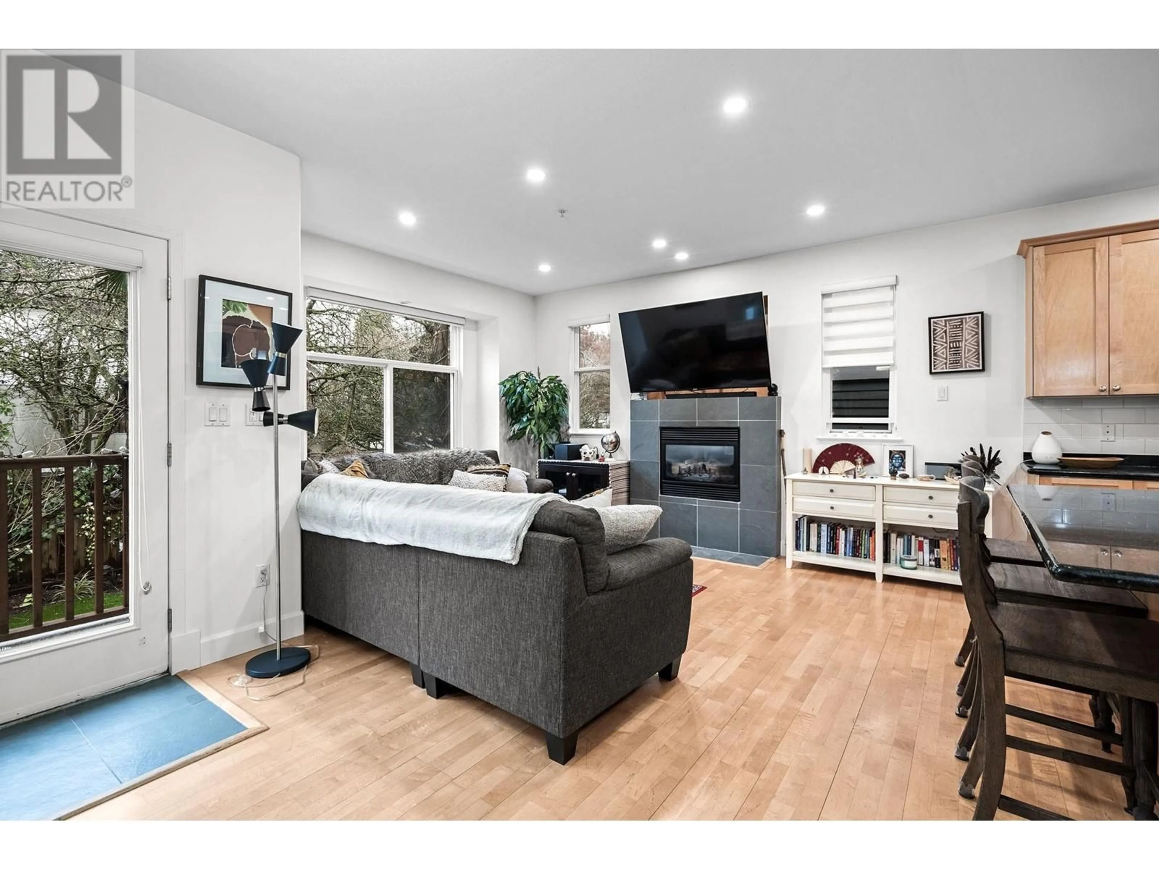 Living room with furniture, wood/laminate floor for 1789 E 5TH AVENUE, Vancouver British Columbia V5N1L9