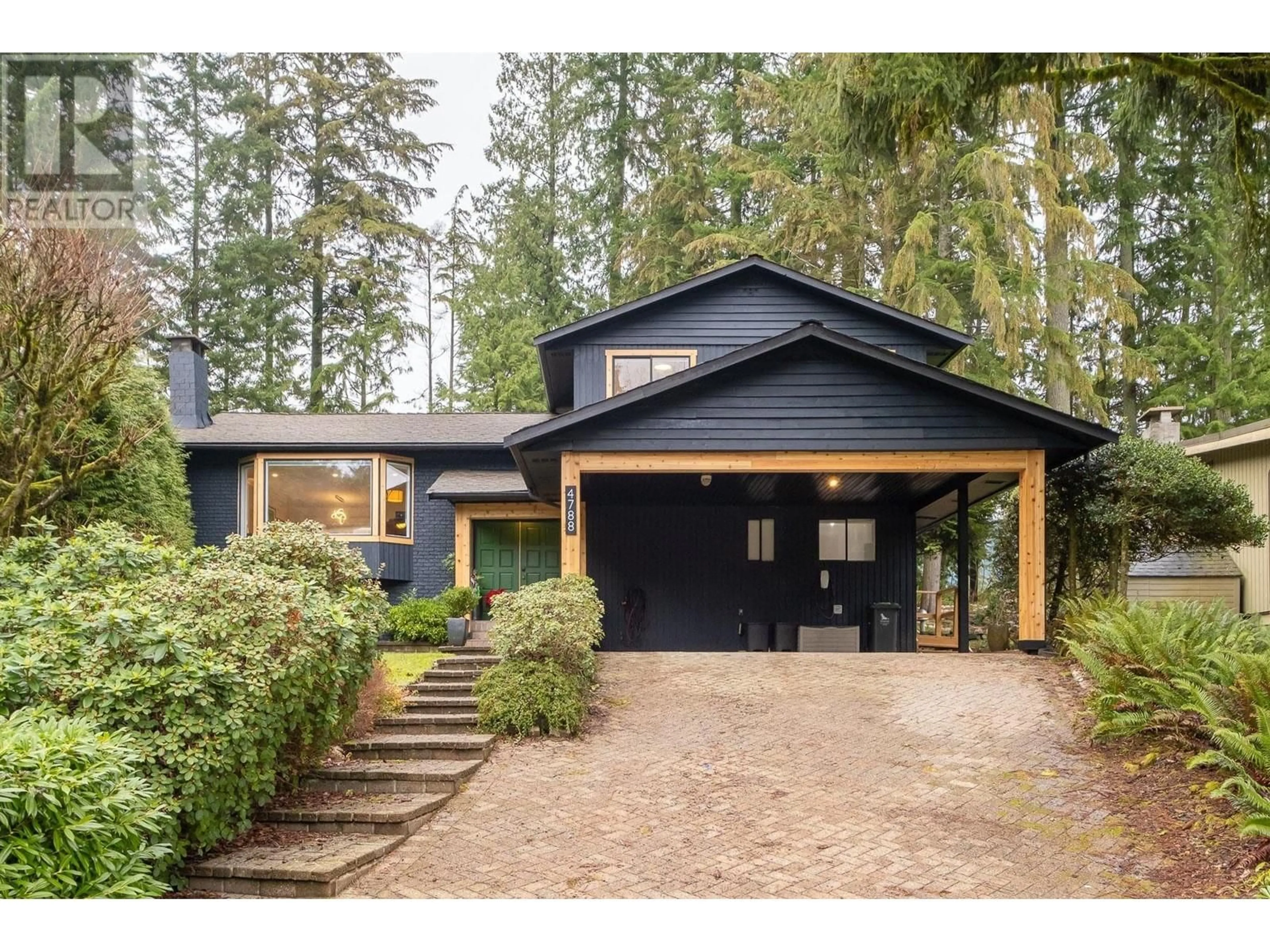 Home with vinyl exterior material, street for 4788 HOSKINS ROAD, North Vancouver British Columbia V7K2R1