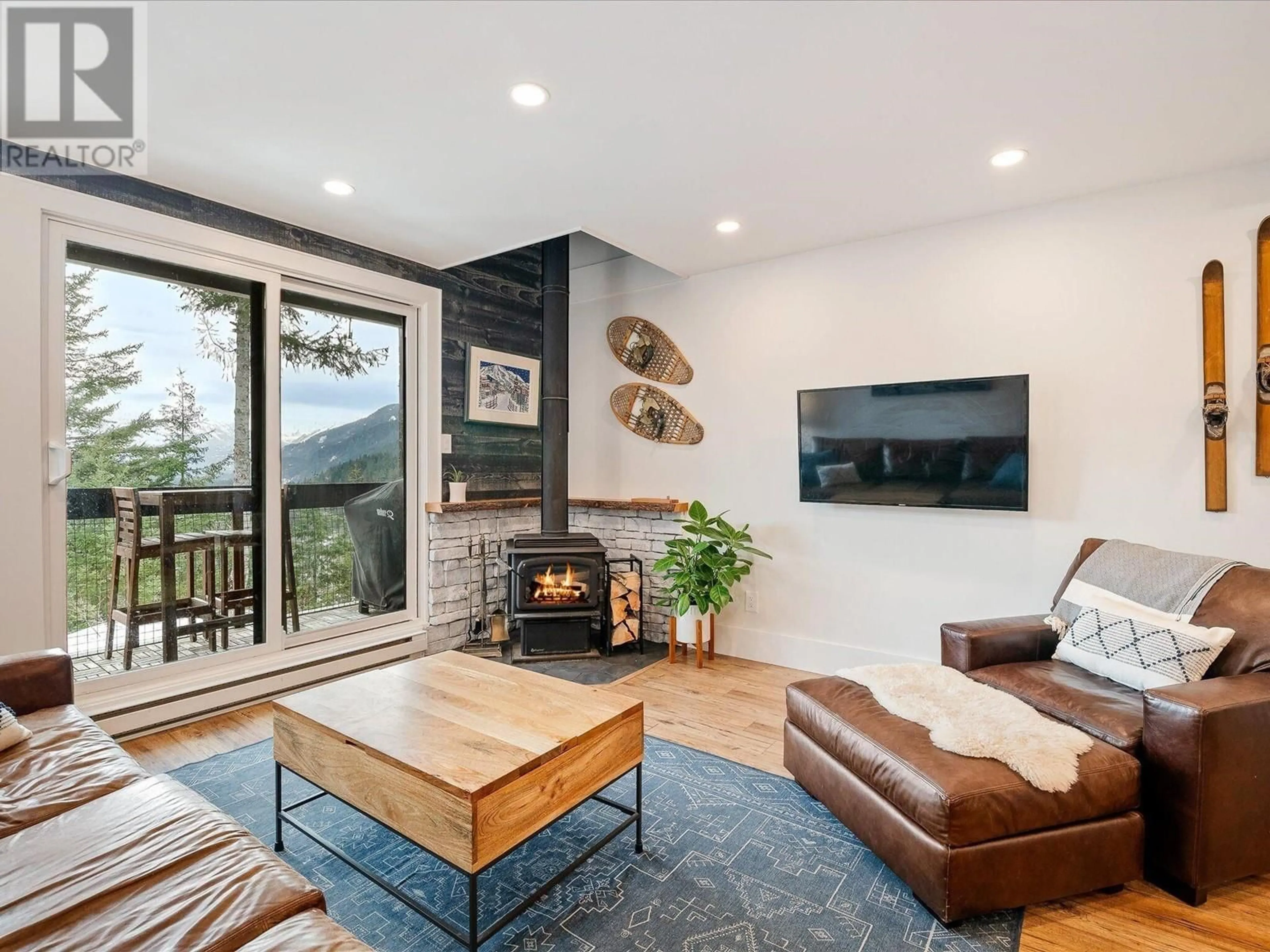 Living room with furniture, wood/laminate floor for 19 2400 CAVENDISH WAY, Whistler British Columbia V8E0L8