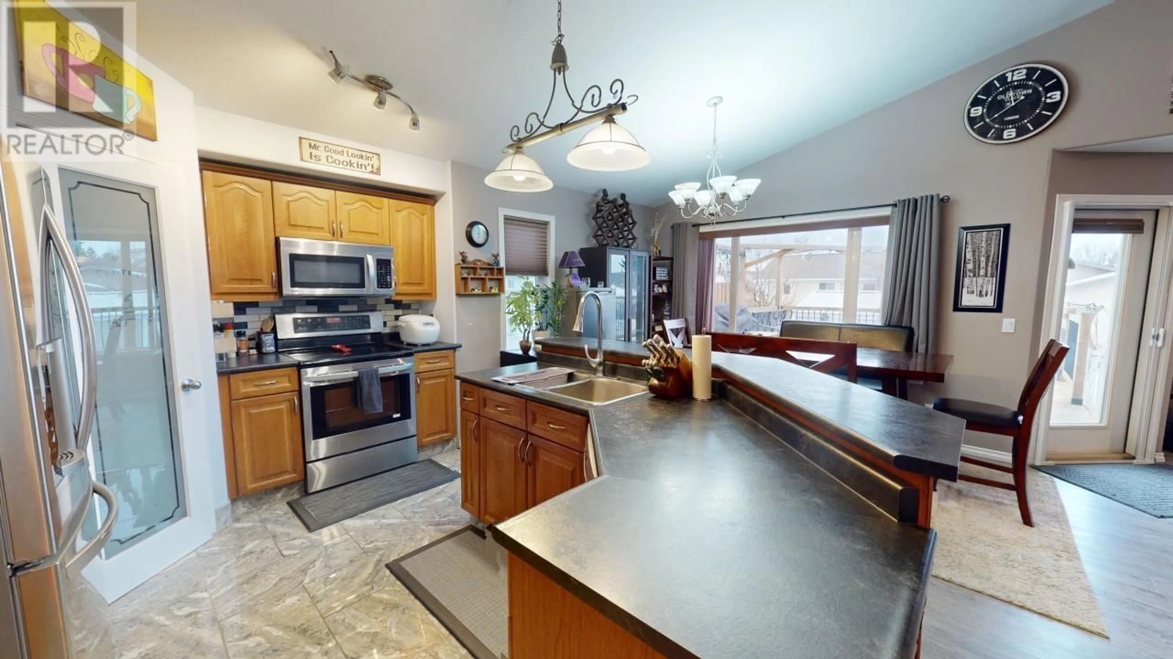 Open concept kitchen, ceramic/tile floor for 11324 97 STREET, Fort St. John British Columbia V1J7H8