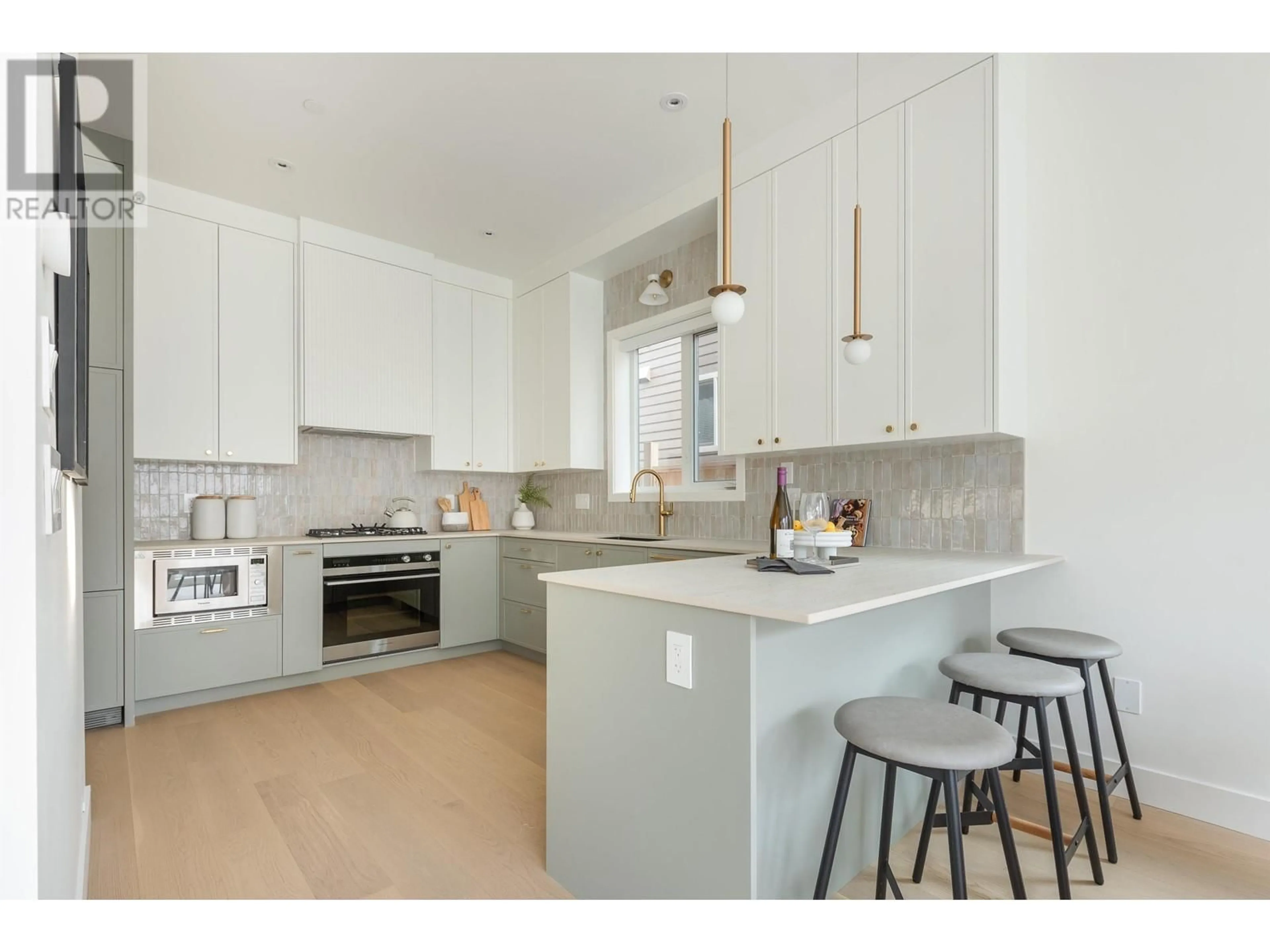 Open concept kitchen, unknown for 2 5807 PRINCE EDWARD STREET, Vancouver British Columbia V5W2X8