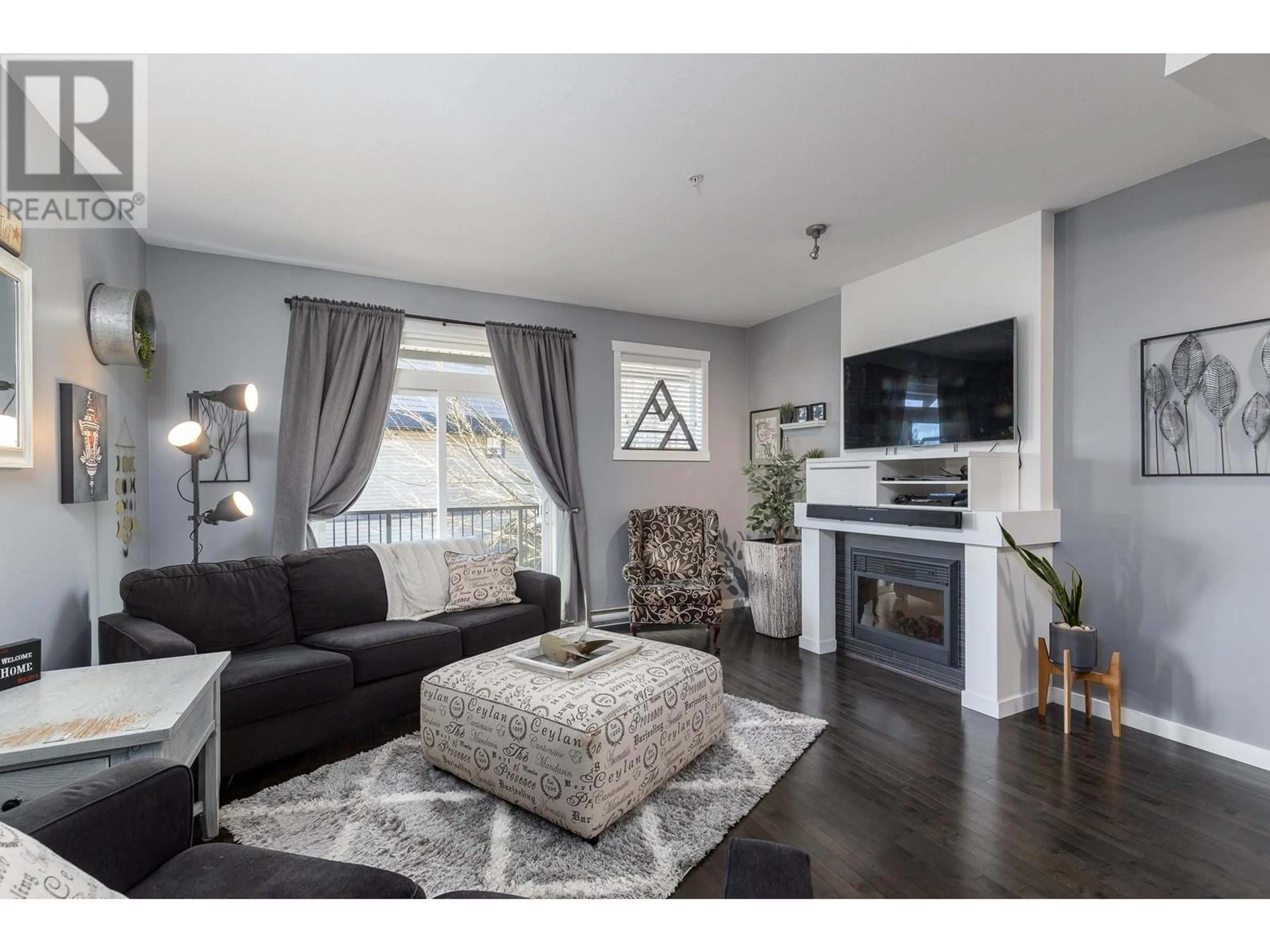 Living room with furniture, wood/laminate floor for 2 13819 232 STREET, Maple Ridge British Columbia V4R0C7