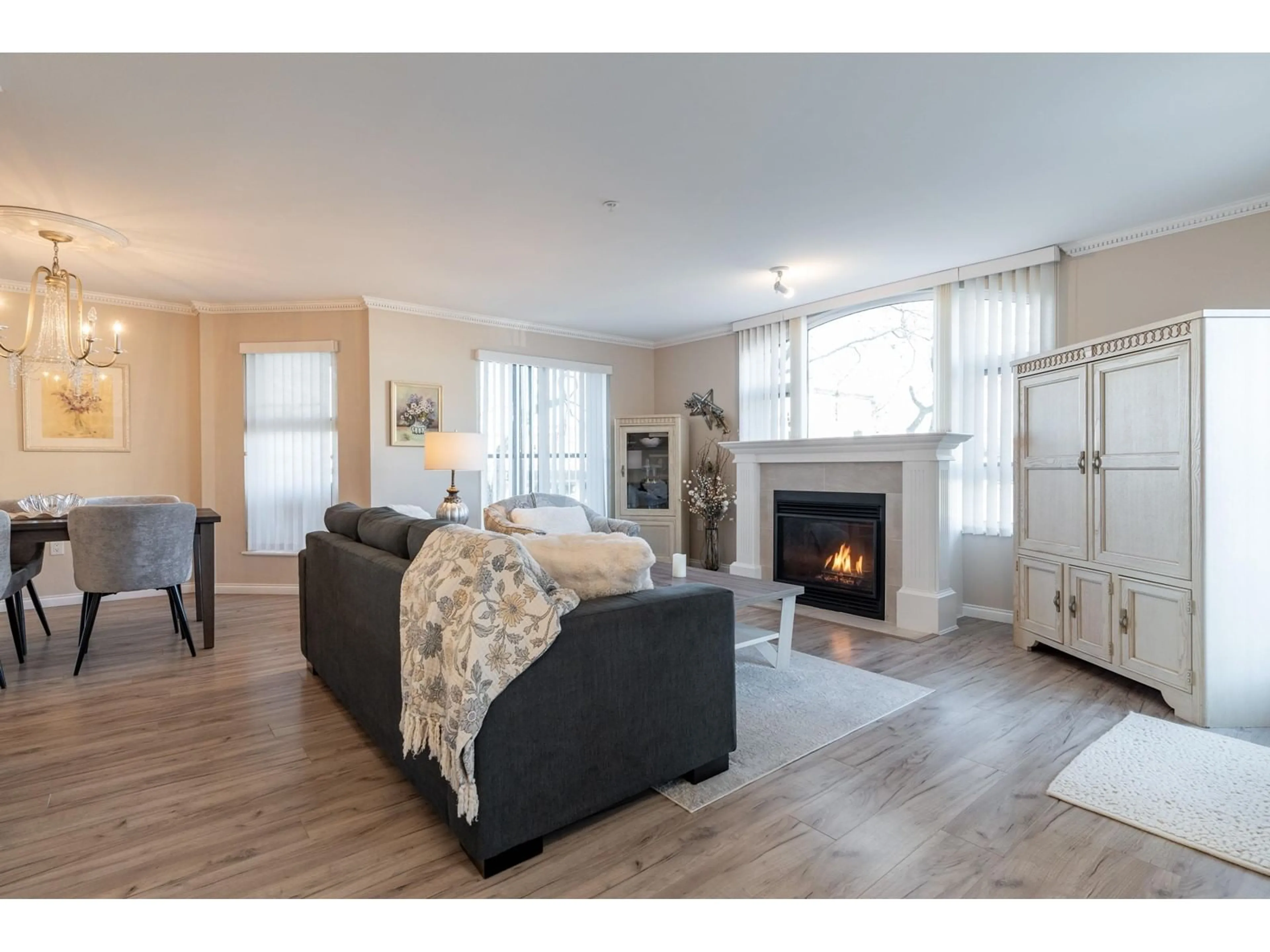 Living room with furniture, wood/laminate floor for 309 15210 PACIFIC AVENUE, White Rock British Columbia V4B5L2