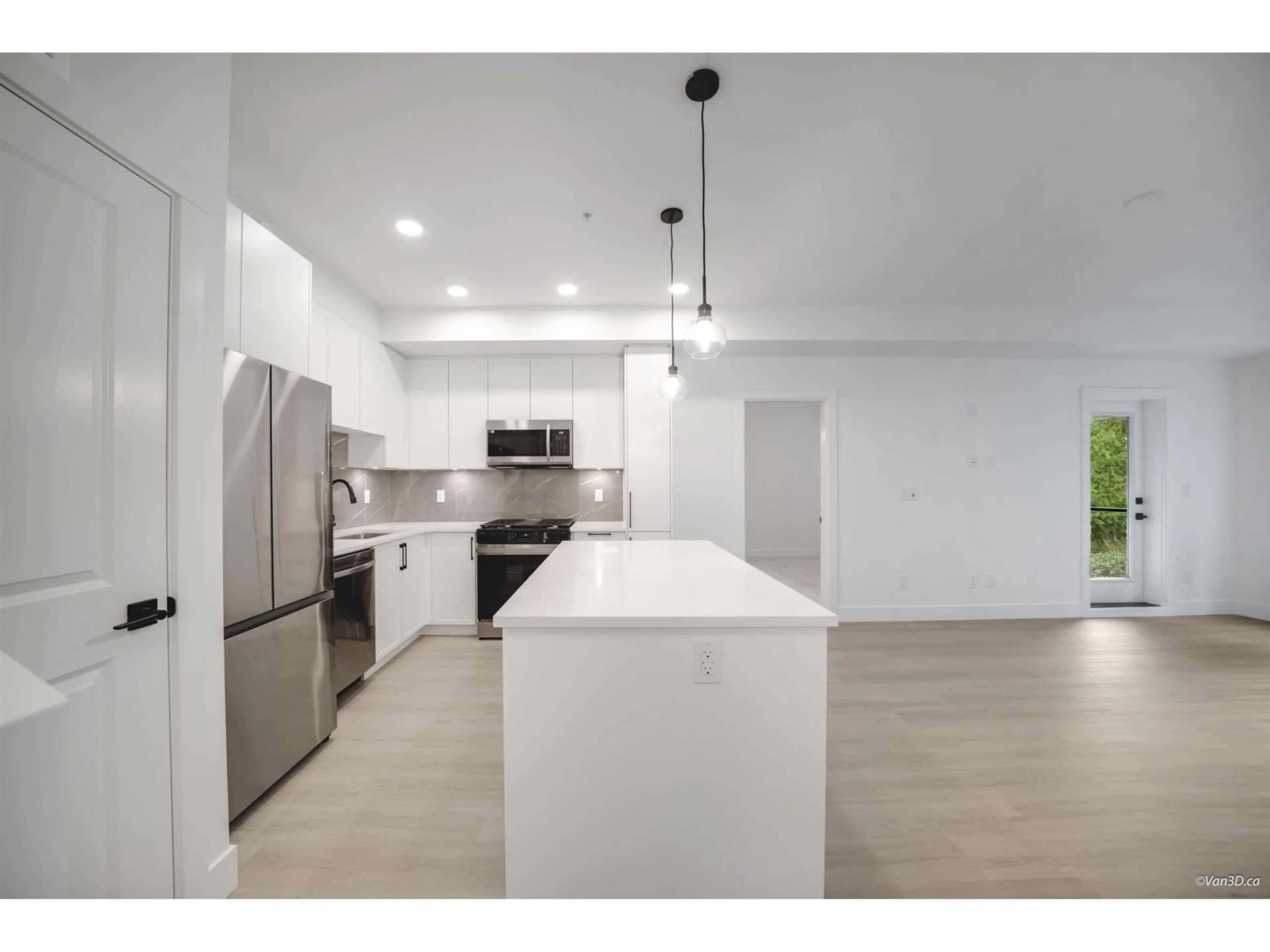 Open concept kitchen, unknown for 309 3480 146A STREET, Surrey British Columbia V4P0H6