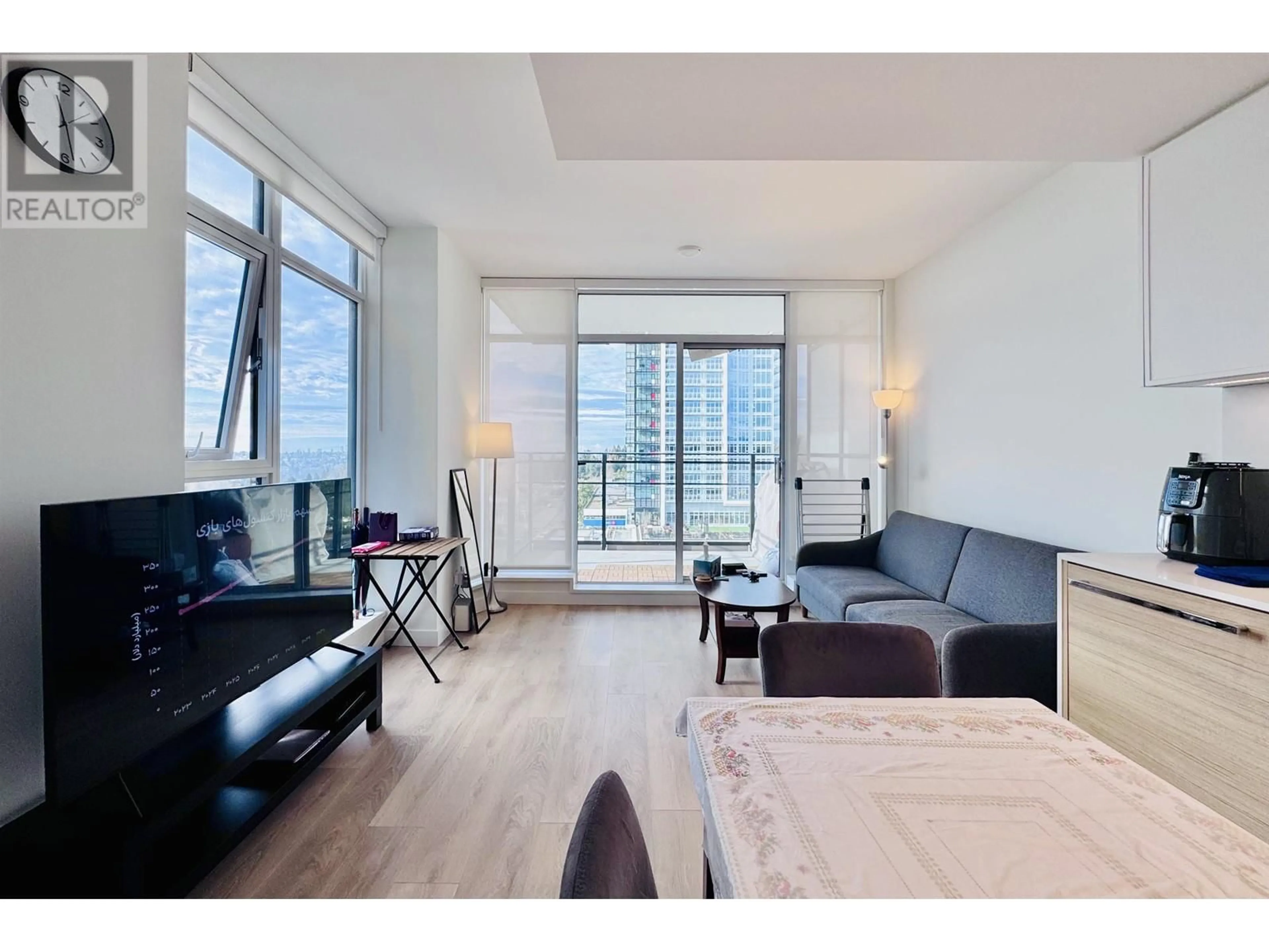Living room with furniture, wood/laminate floor for 806 - 1045 AUSTIN AVENUE, Coquitlam British Columbia V3K0G9