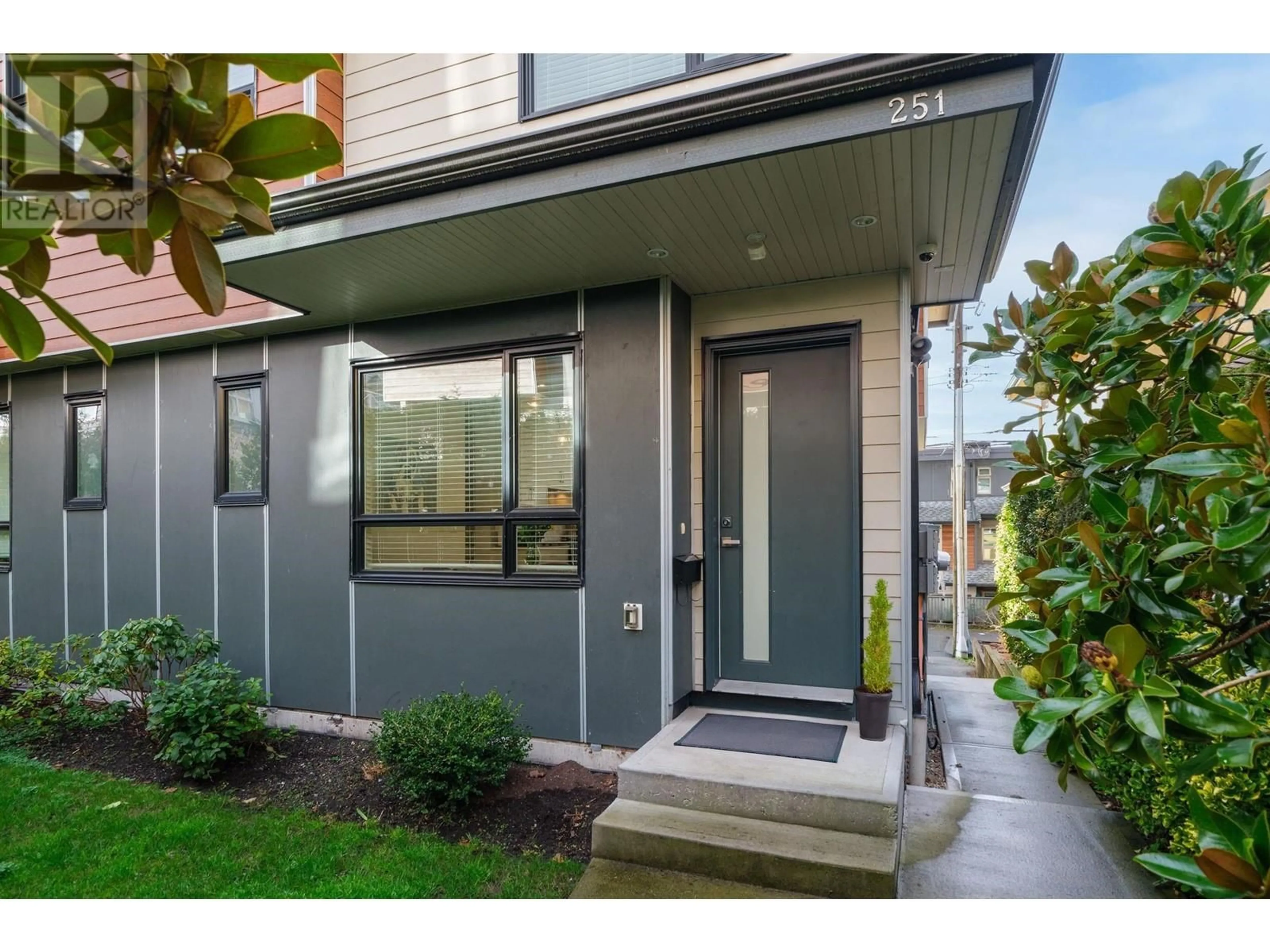 Home with vinyl exterior material, street for 251 E 6TH STREET, North Vancouver British Columbia V7L1P4