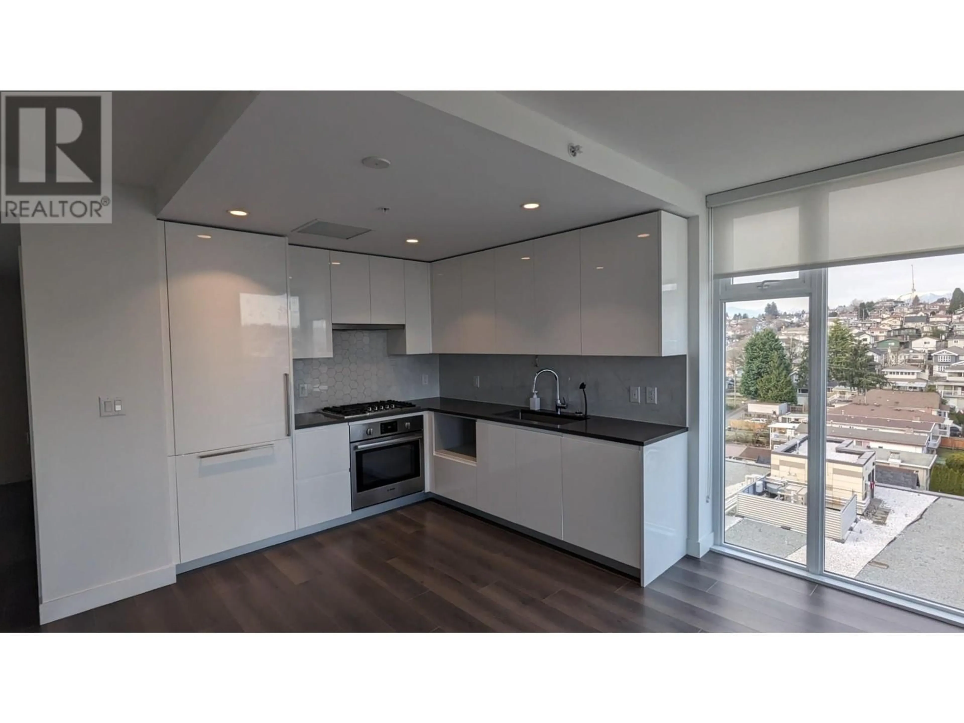 Open concept kitchen, unknown for 1003 8181 CHESTER STREET, Vancouver British Columbia V5X0J9