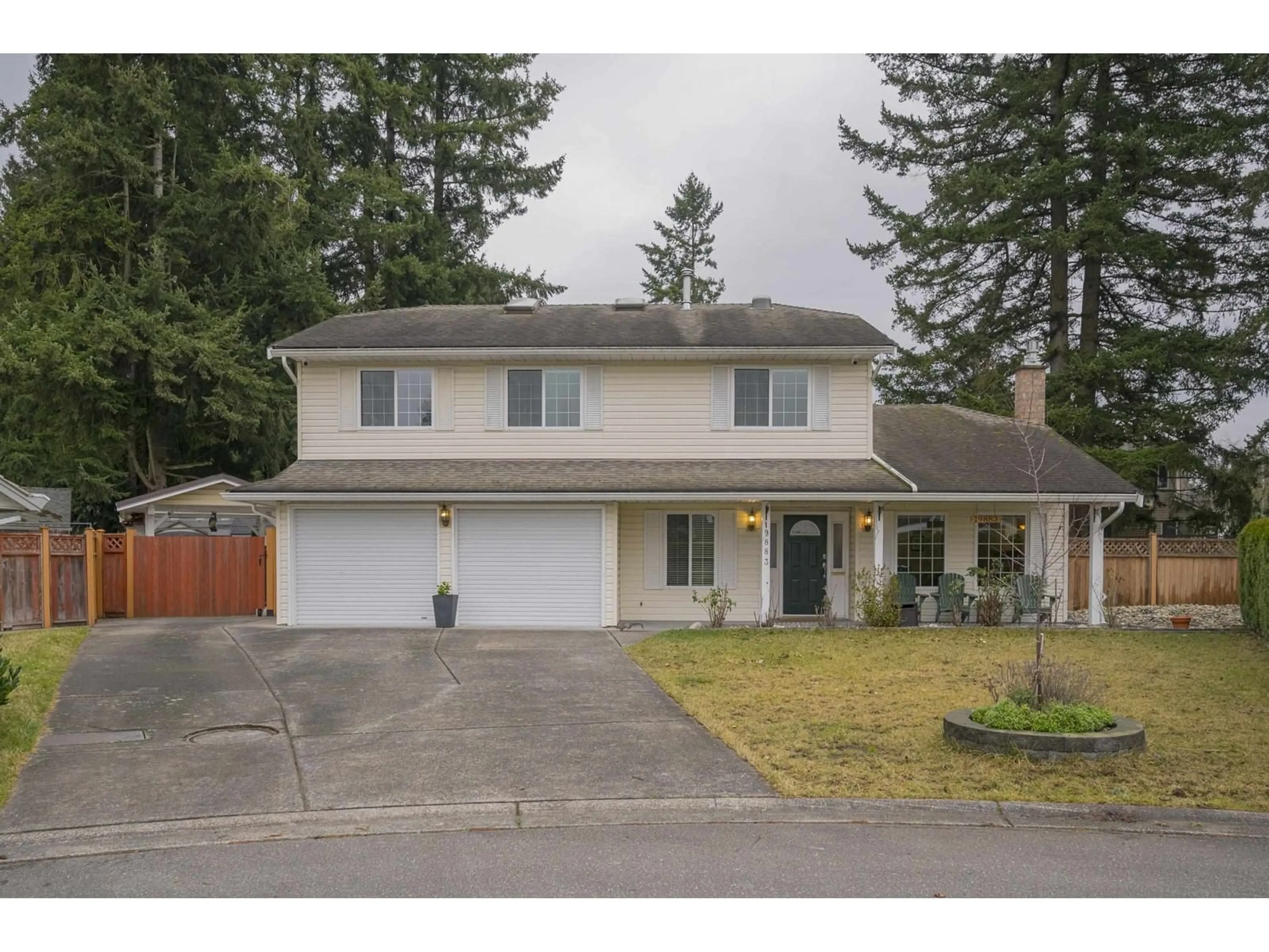 Home with vinyl exterior material, street for 19883 34A AVENUE, Langley British Columbia V3A7W7