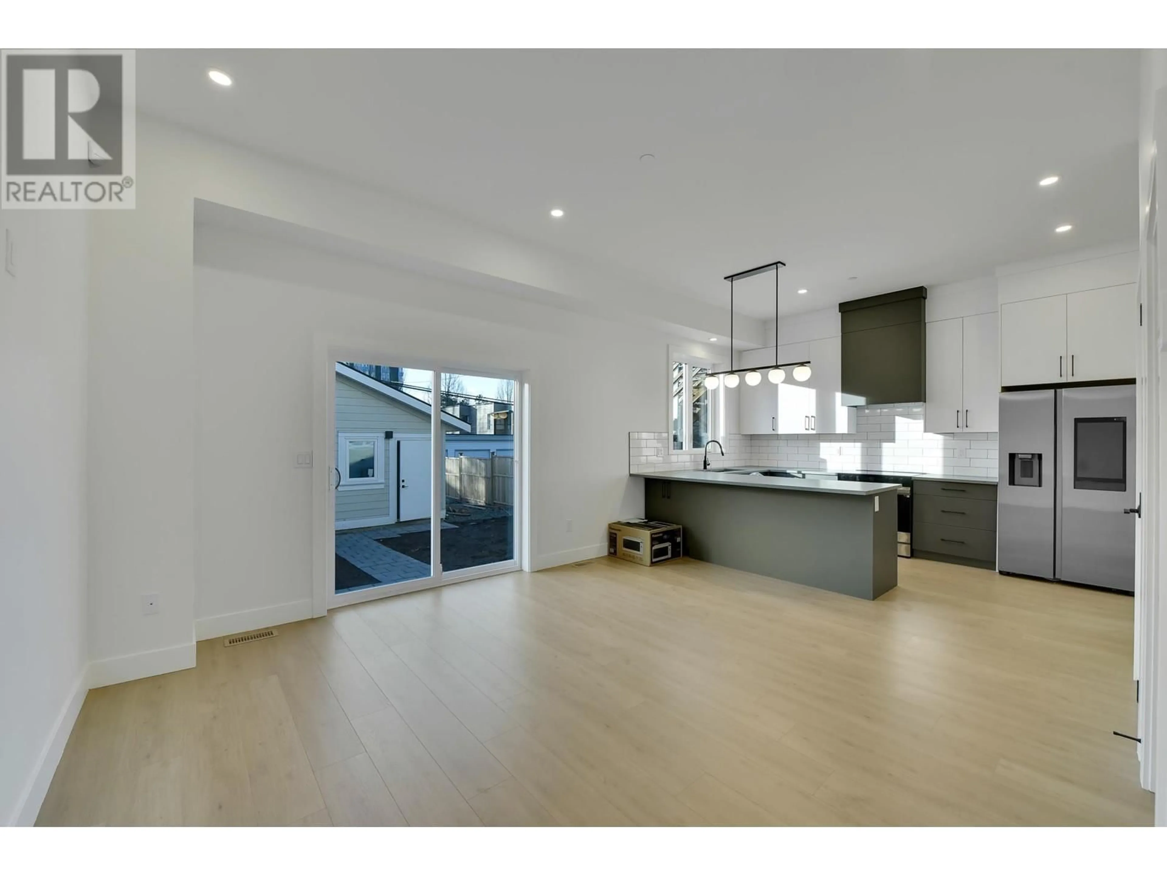 Open concept kitchen, unknown for 2 1436 E 1ST AVENUE, Vancouver British Columbia V5N1A3