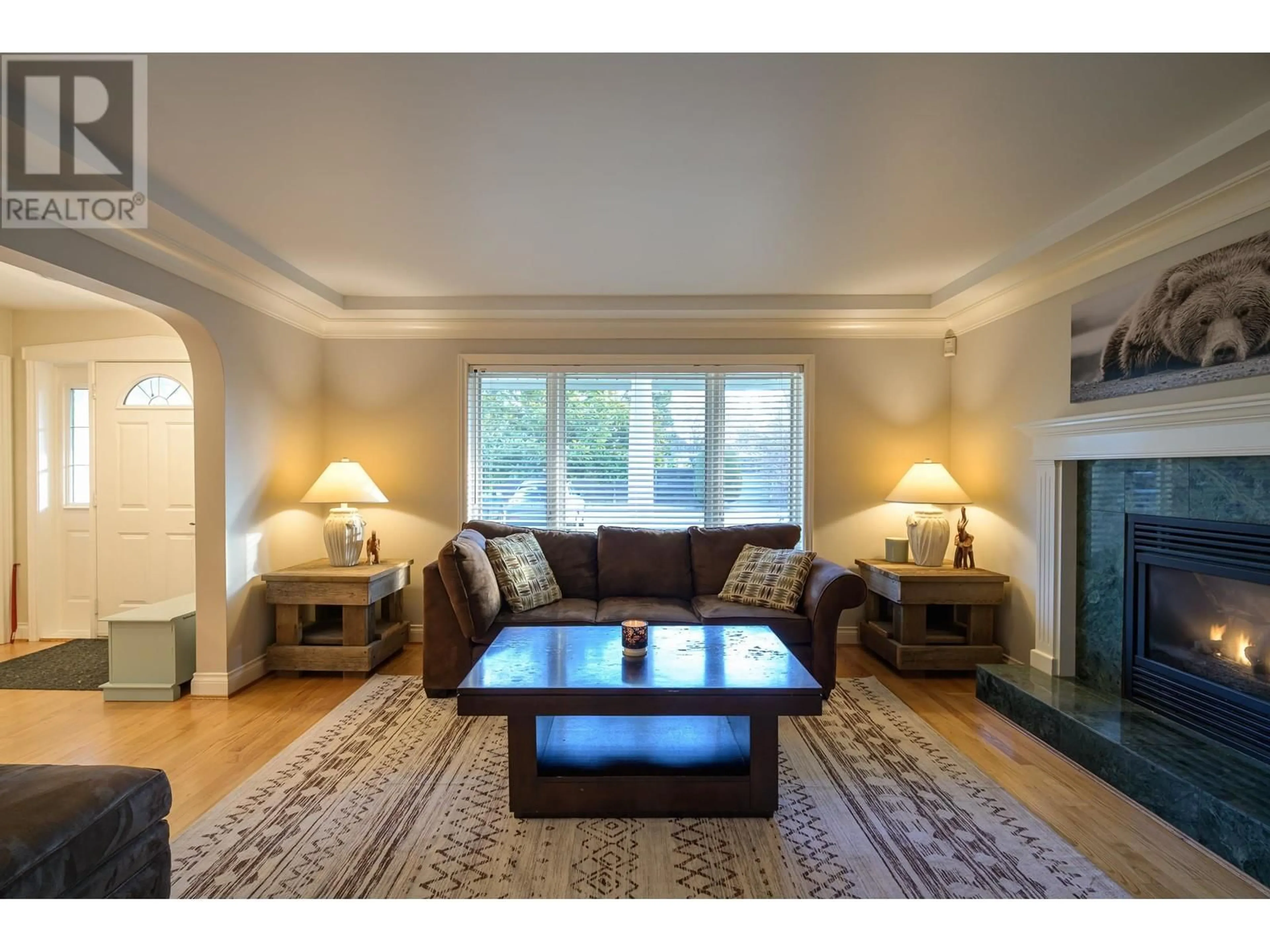 Living room with furniture, wood/laminate floor for 189 65B STREET, Delta British Columbia V4L1M9