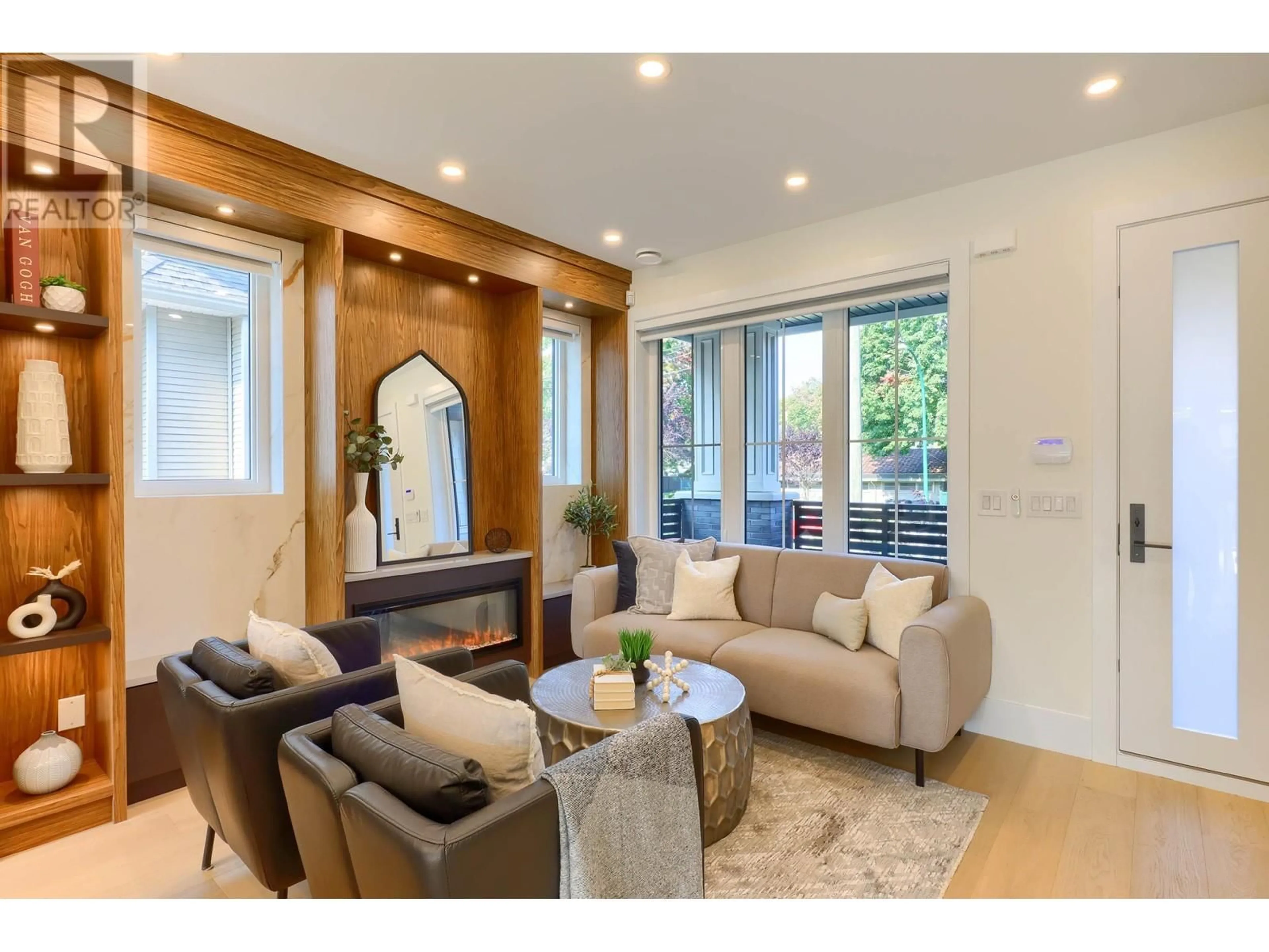 Living room with furniture, wood/laminate floor for 5262 MCKINNON STREET, Vancouver British Columbia V5R4C6