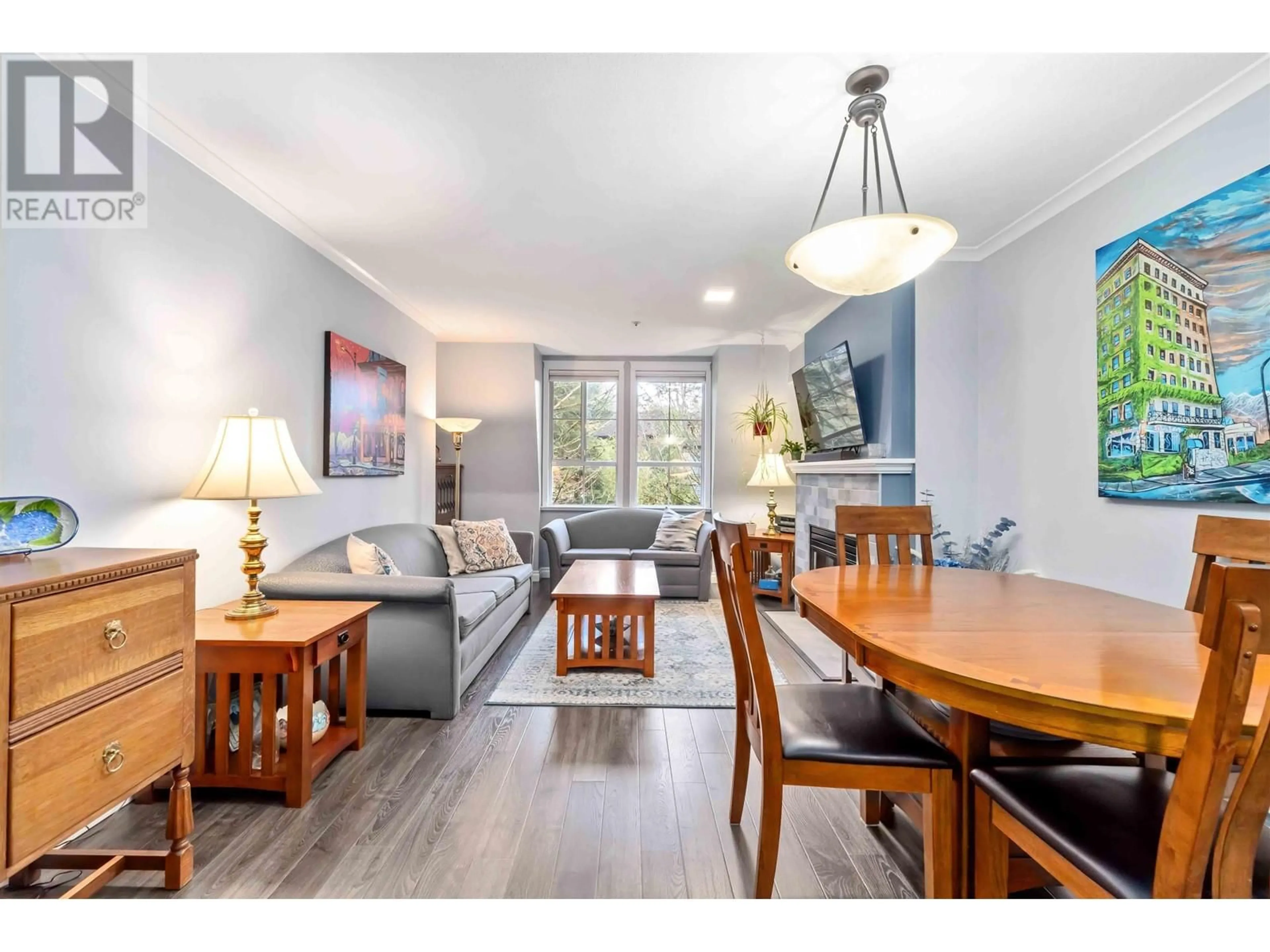 Living room with furniture, wood/laminate floor for 312 295 SCHOOLHOUSE STREET, Coquitlam British Columbia V3K6X5