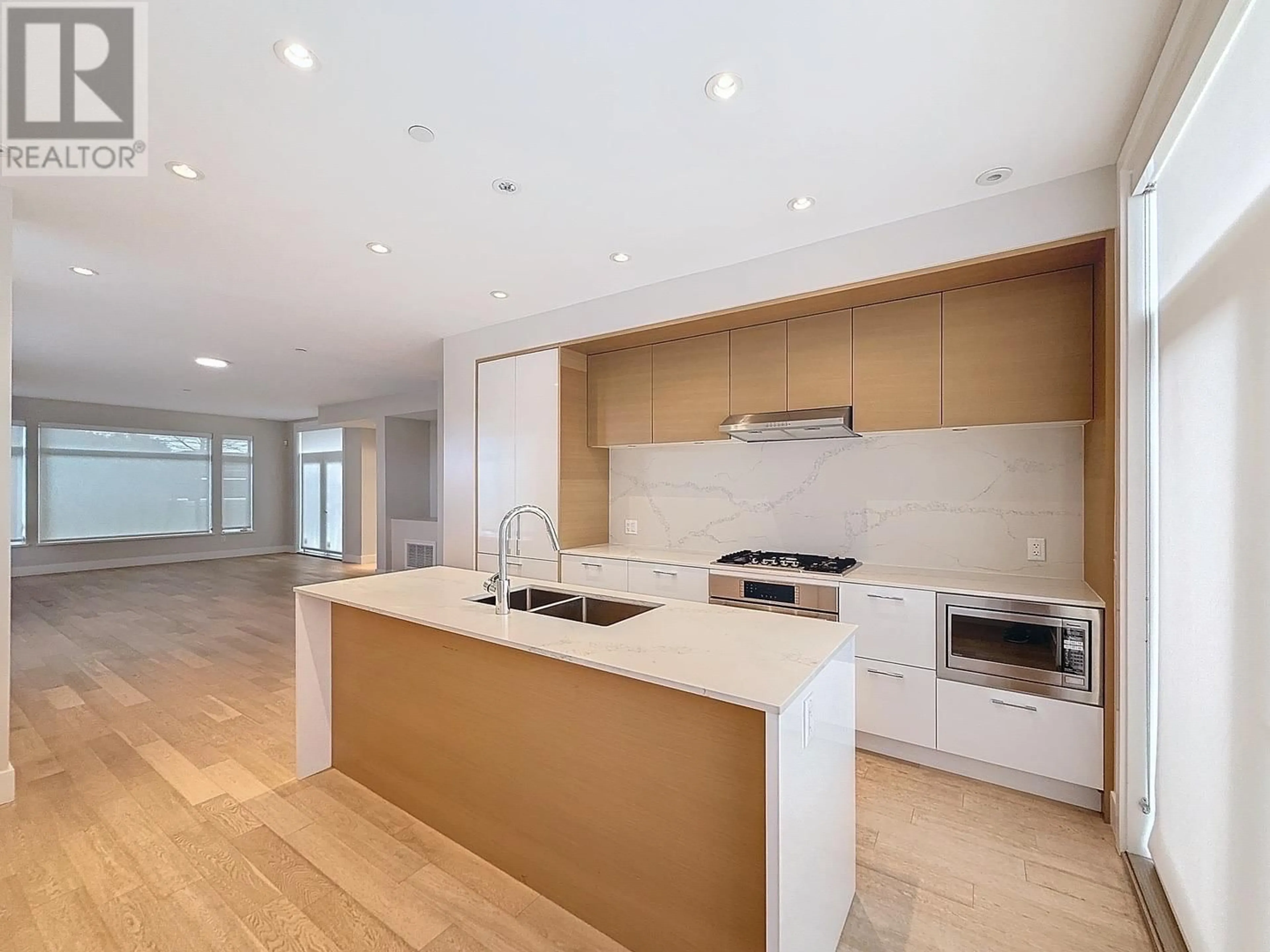 Open concept kitchen, unknown for 7488 GRANVILLE STREET, Vancouver British Columbia V6P0G1