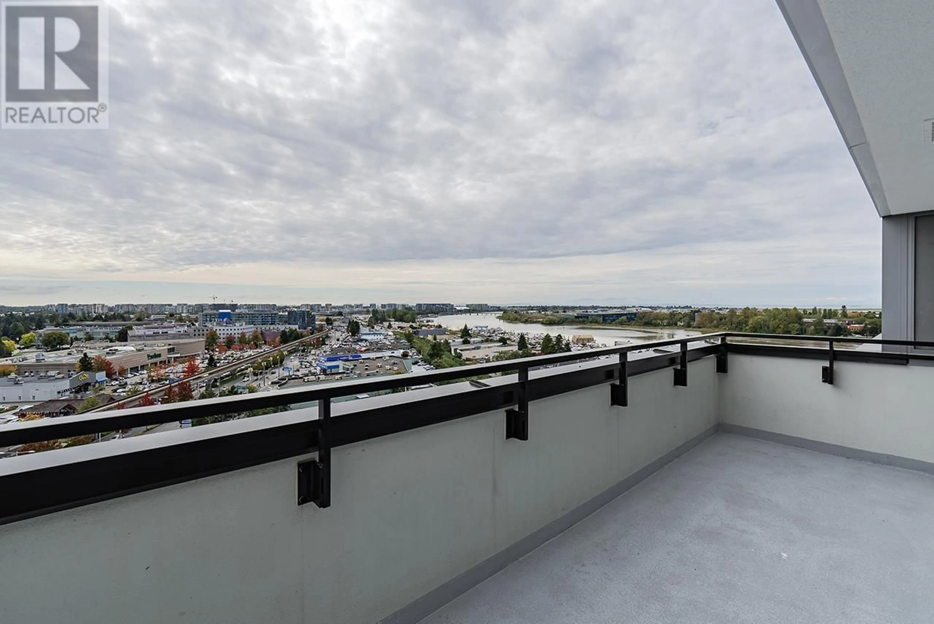 Balcony in the apartment, city buildings view from balcony for 1602 8155 CAPSTAN WAY, Richmond British Columbia V6X0V3