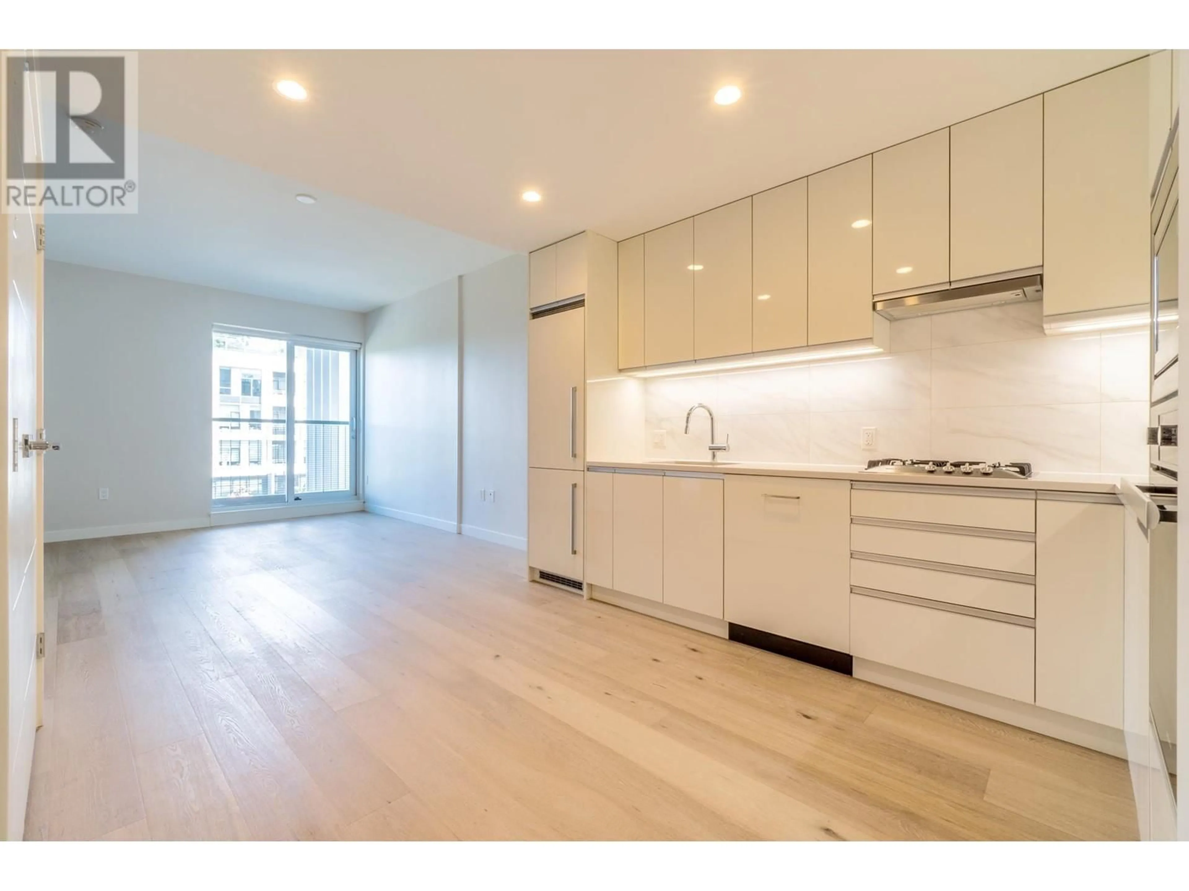 Open concept kitchen, unknown for 208 - 528 KING EDWARD AVENUE, Vancouver British Columbia V5Z2C3