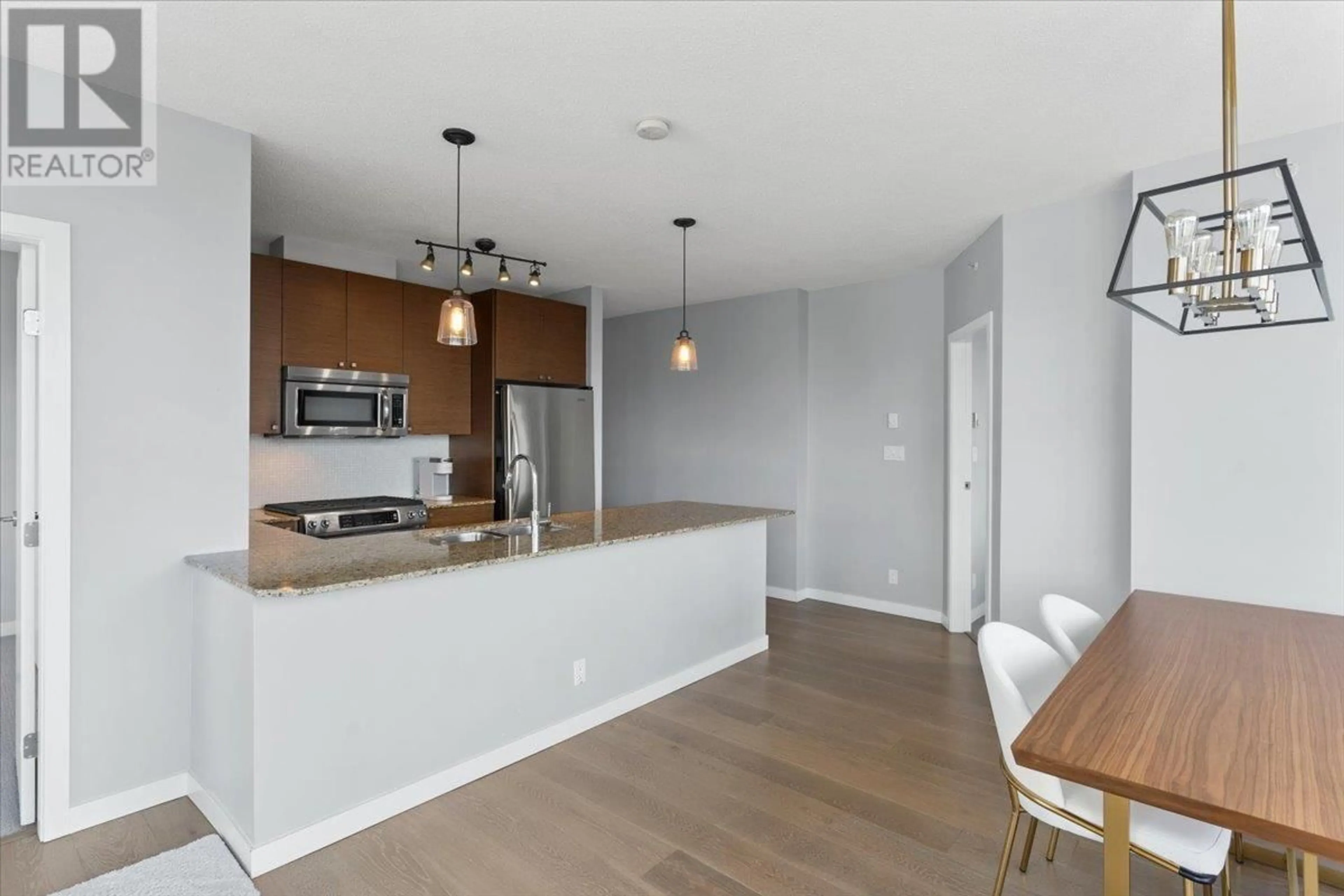 Open concept kitchen, wood/laminate floor for 1506 400 CAPILANO ROAD, Port Moody British Columbia V3H0E1