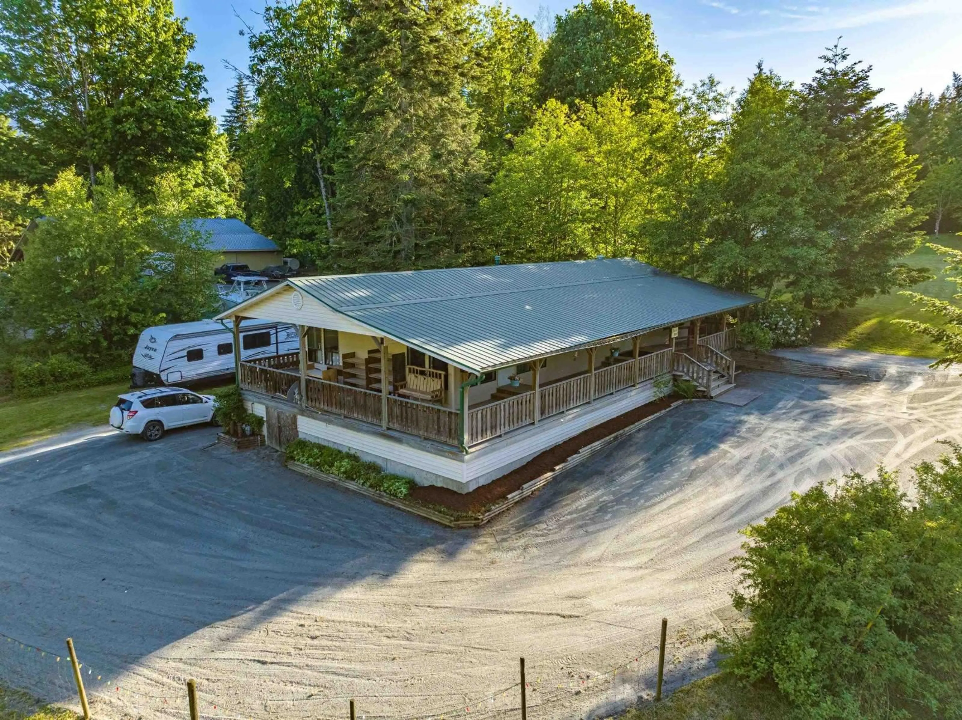 A pic from outside/outdoor area/front of a property/back of a property/a pic from drone, unknown for 47400 EXTROM ROAD|Ryder Lake, Sardis British Columbia V2R4T1