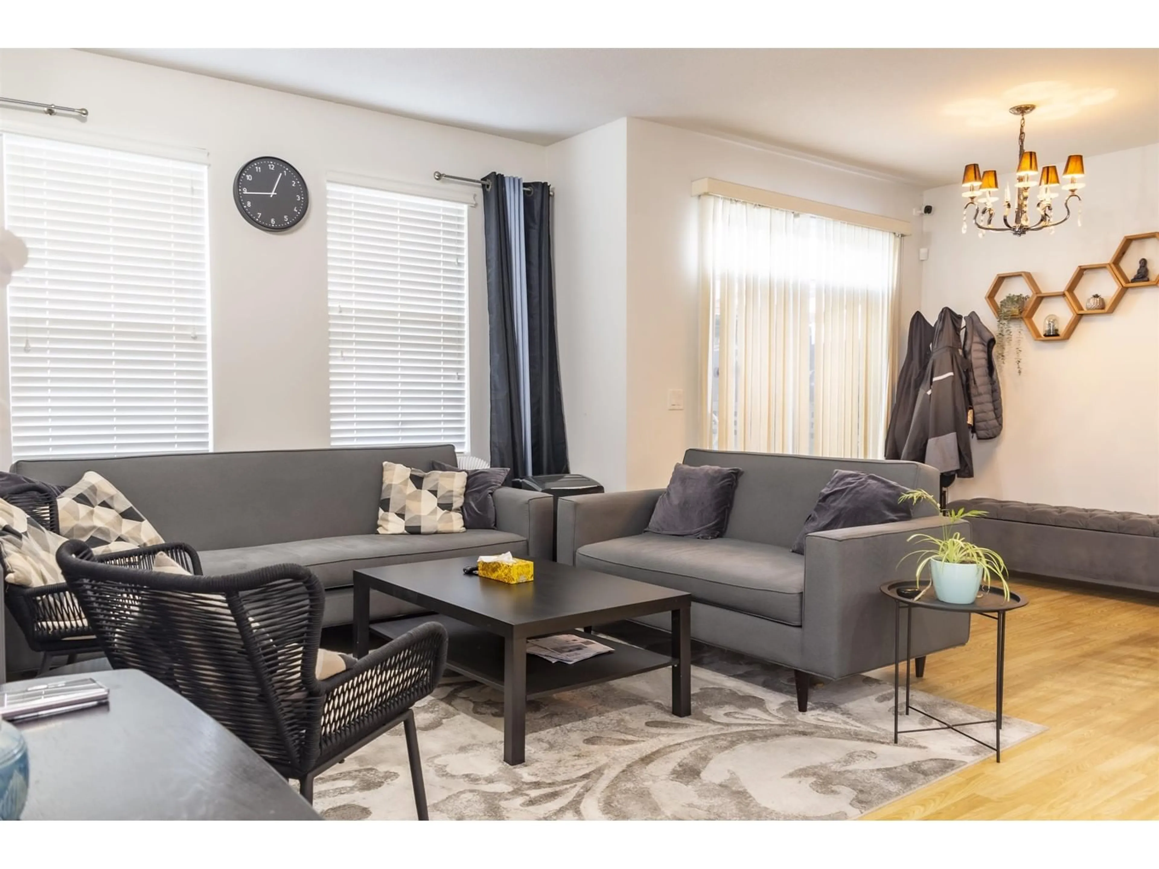 Living room with furniture, wood/laminate floor for 3 - 18055 70, Surrey British Columbia V3S6X3