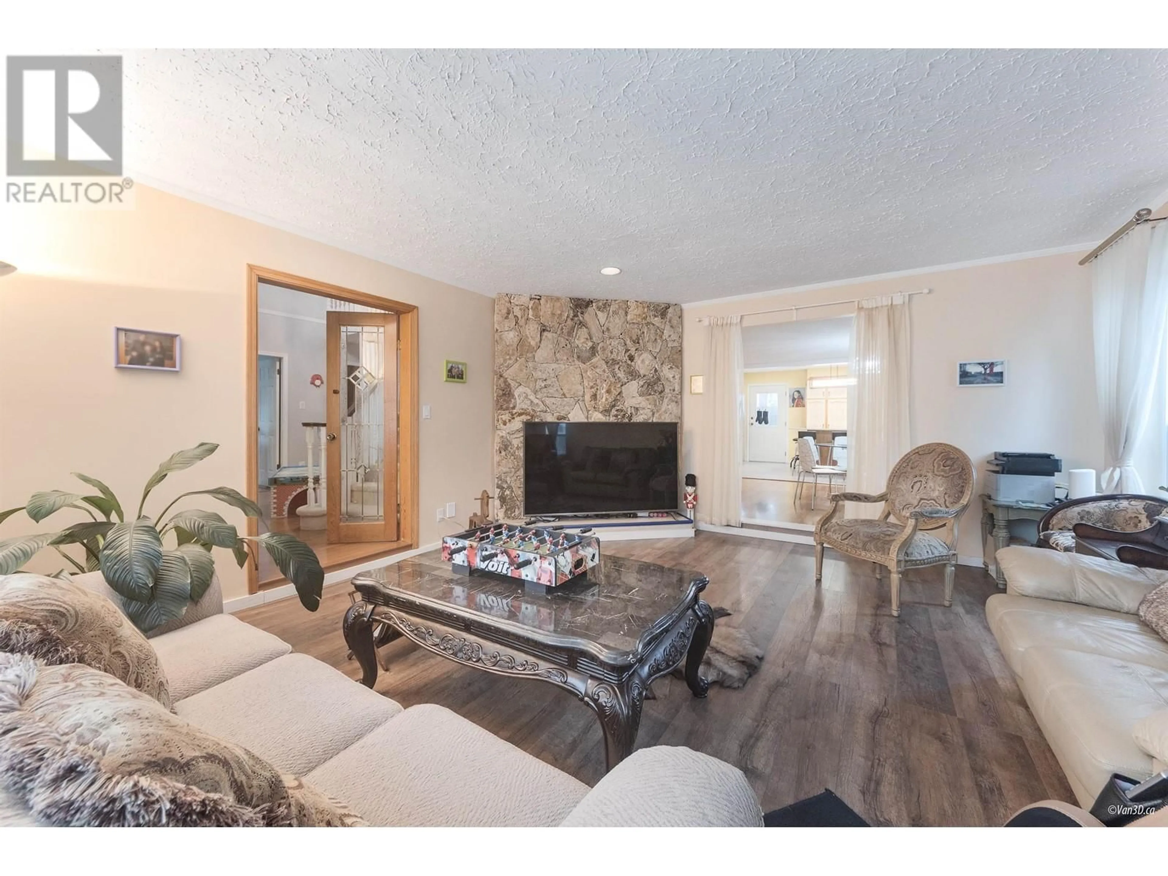 Living room with furniture, wood/laminate floor for 4328 FORTUNE AVENUE, Richmond British Columbia V7E5P8