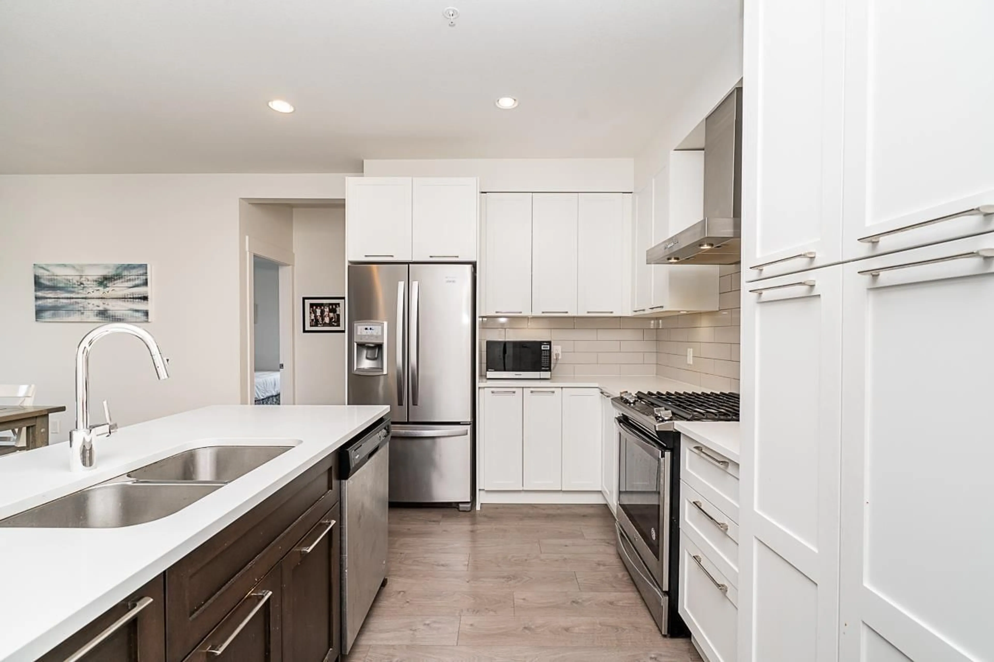 Open concept kitchen, unknown for 304 22087 49 AVENUE, Langley British Columbia V3A0K4