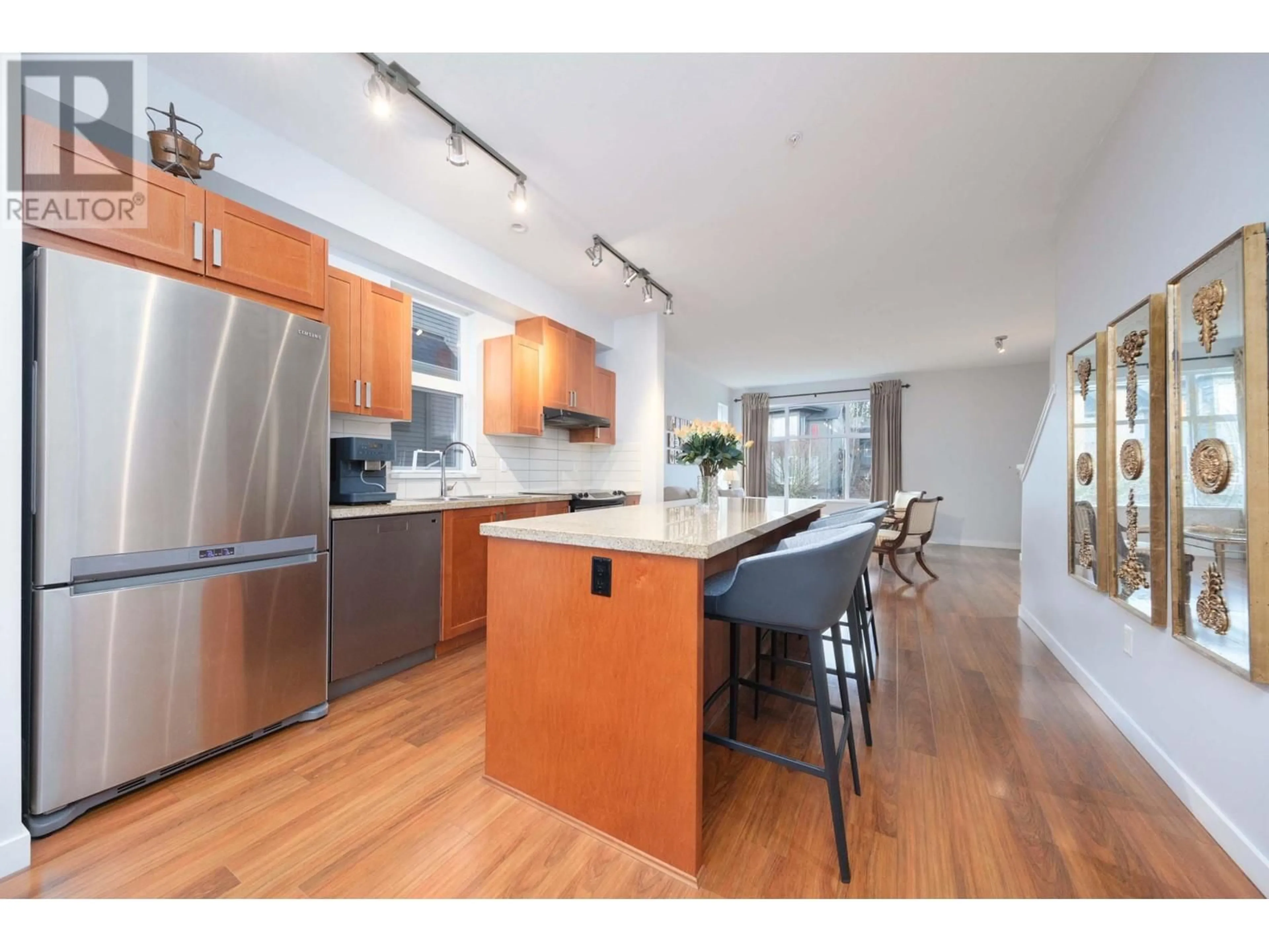 Open concept kitchen, wood/laminate floor for 722 ORWELL STREET, North Vancouver British Columbia V7J0A5