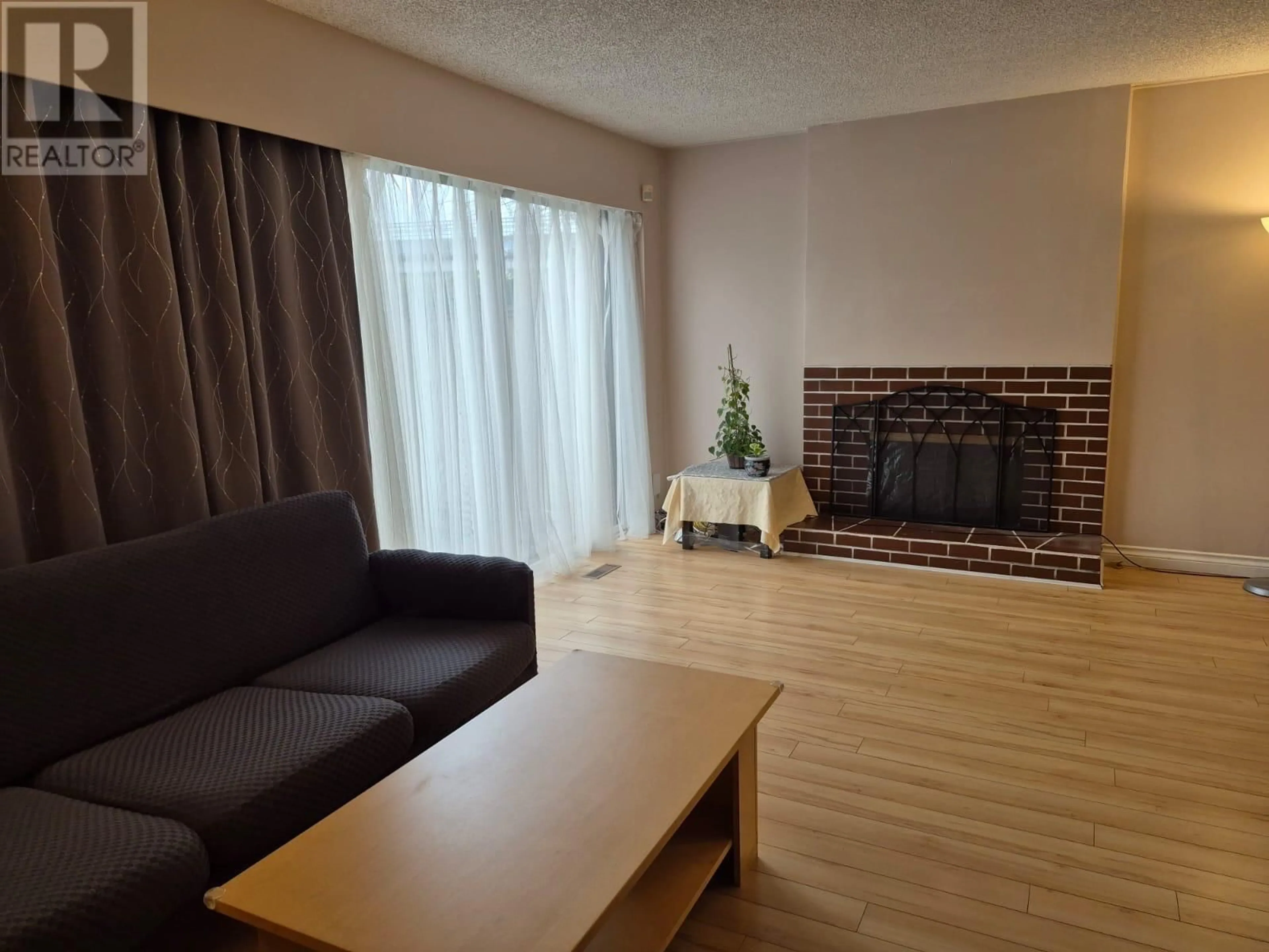 Living room with furniture, wood/laminate floor for 2947 MIRA PLACE, Burnaby British Columbia V3J1B7