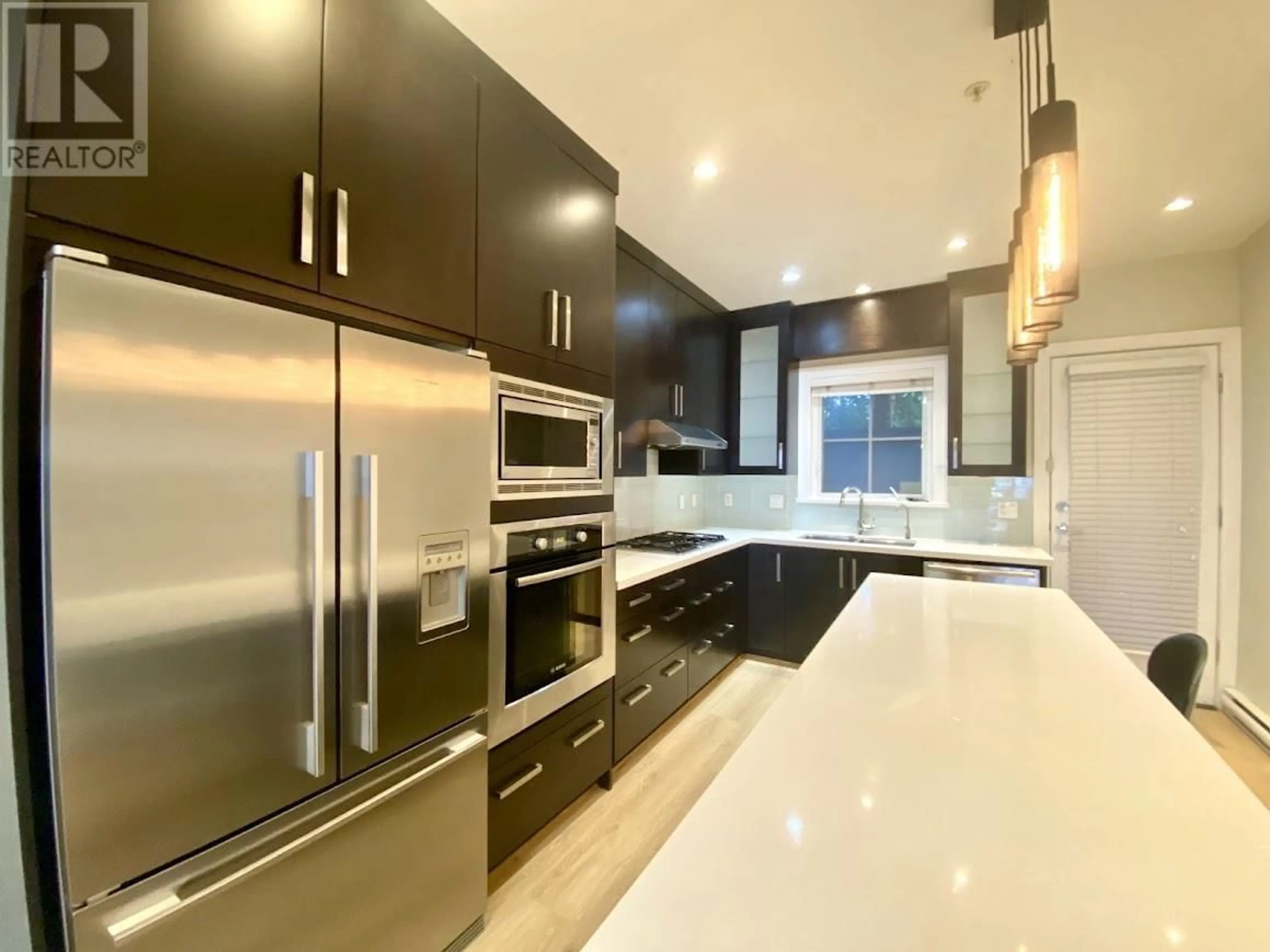 Contemporary kitchen, ceramic/tile floor for 1461 TILNEY MEWS, Vancouver British Columbia V6P0B1