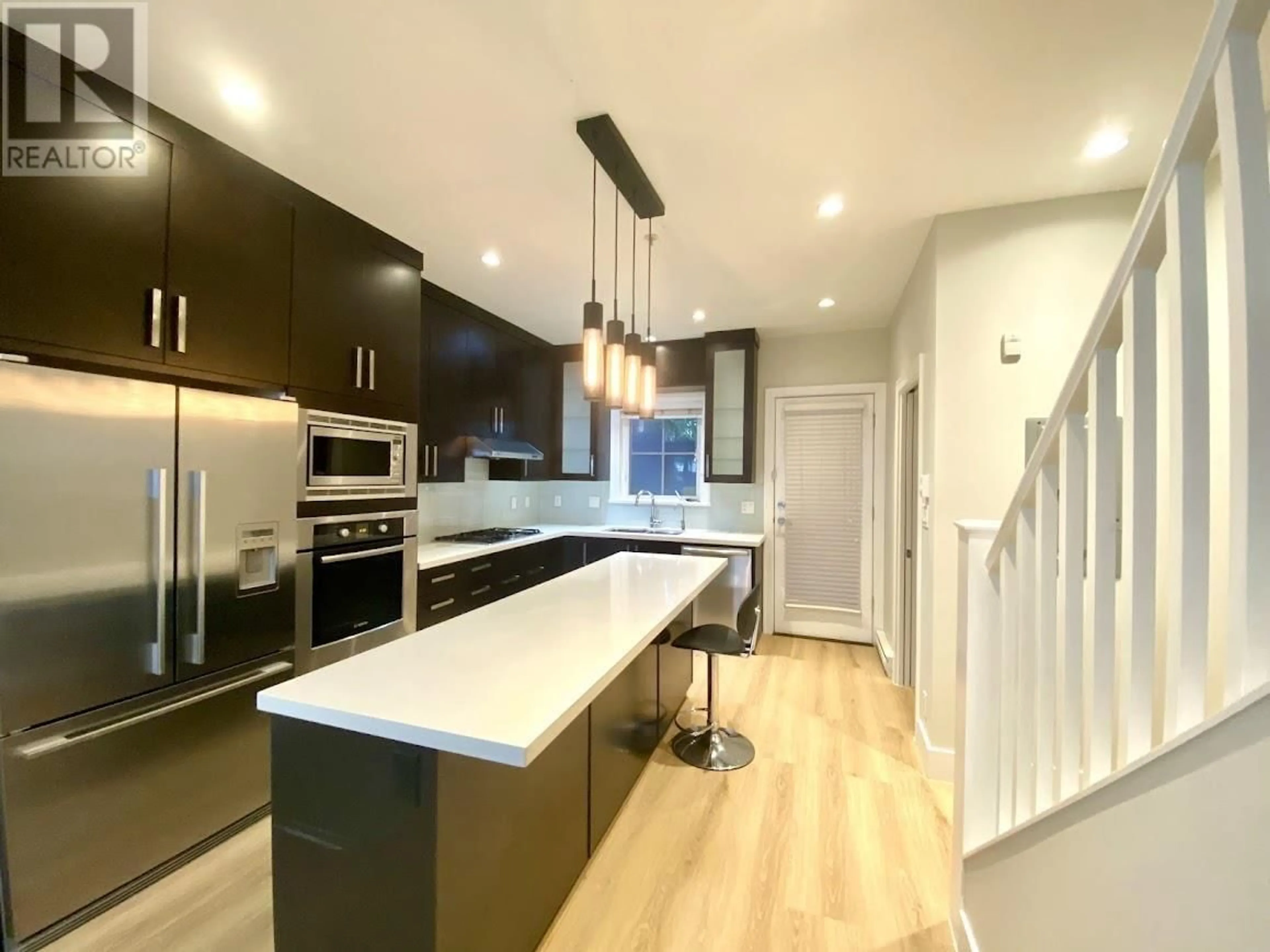 Open concept kitchen, unknown for 1461 TILNEY MEWS, Vancouver British Columbia V6P0B1