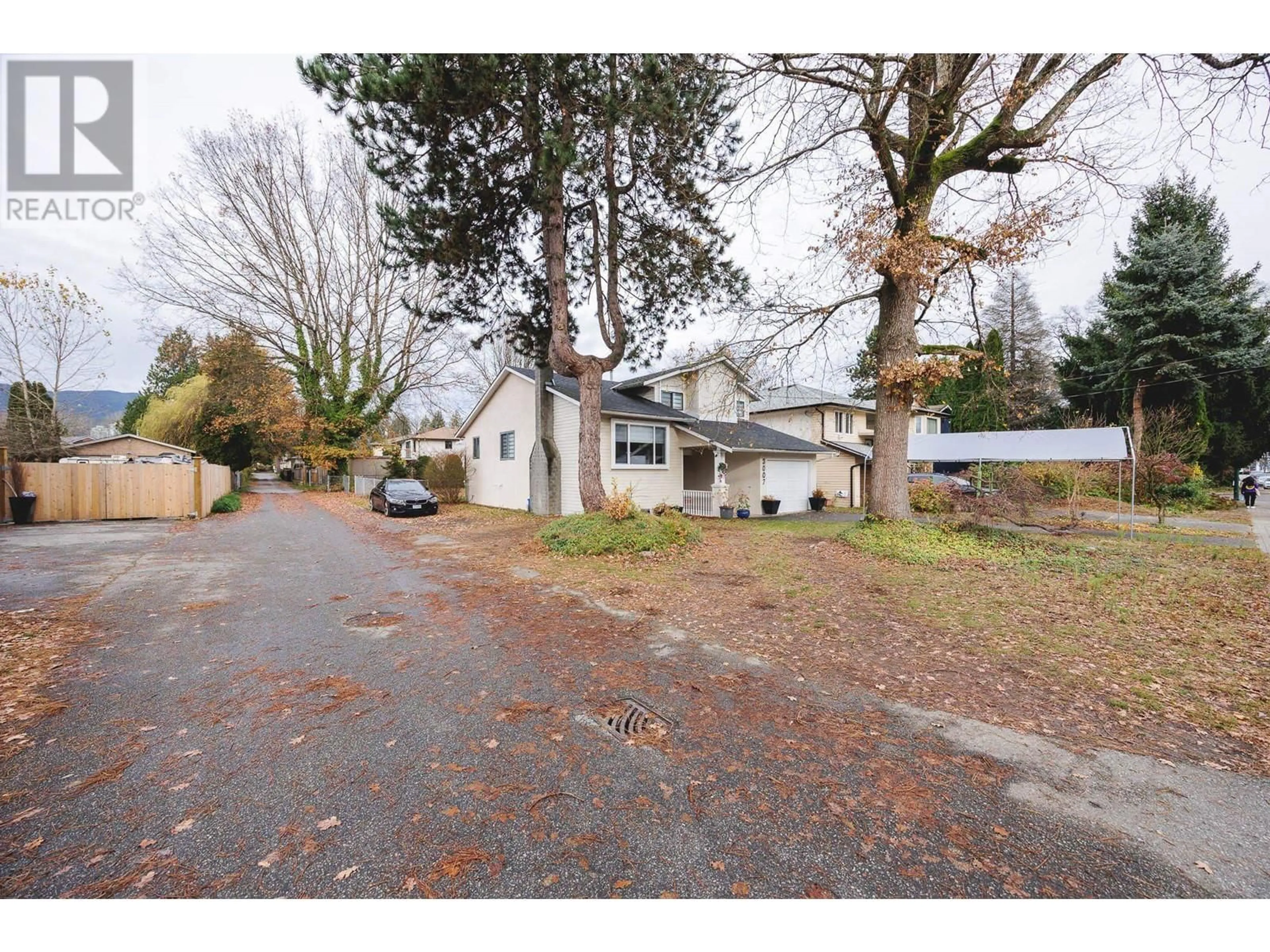 A pic from outside/outdoor area/front of a property/back of a property/a pic from drone, street for 3007 DEWDNEY TRUNK ROAD, Coquitlam British Columbia V3C2J5