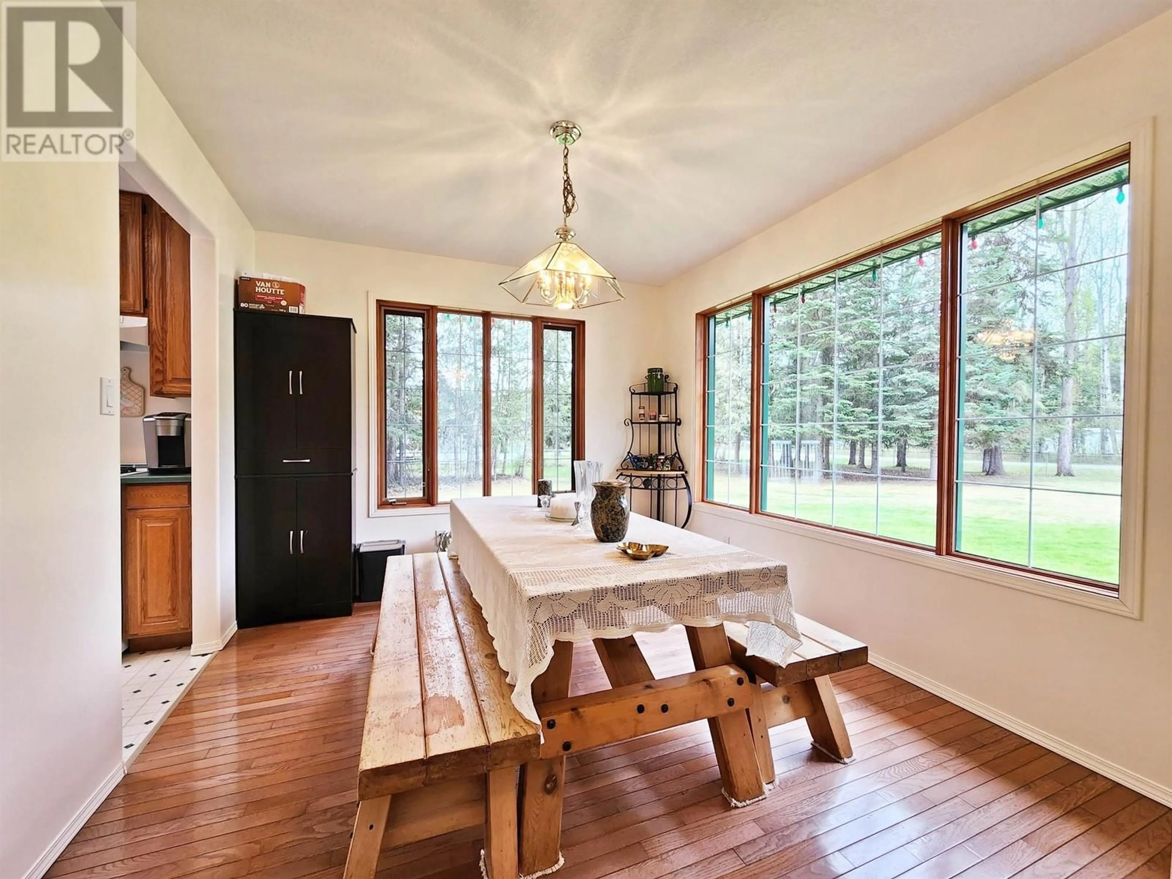 Dining room, wood/laminate floor for 2296 GORDER ROAD, Quesnel British Columbia V2J7A9