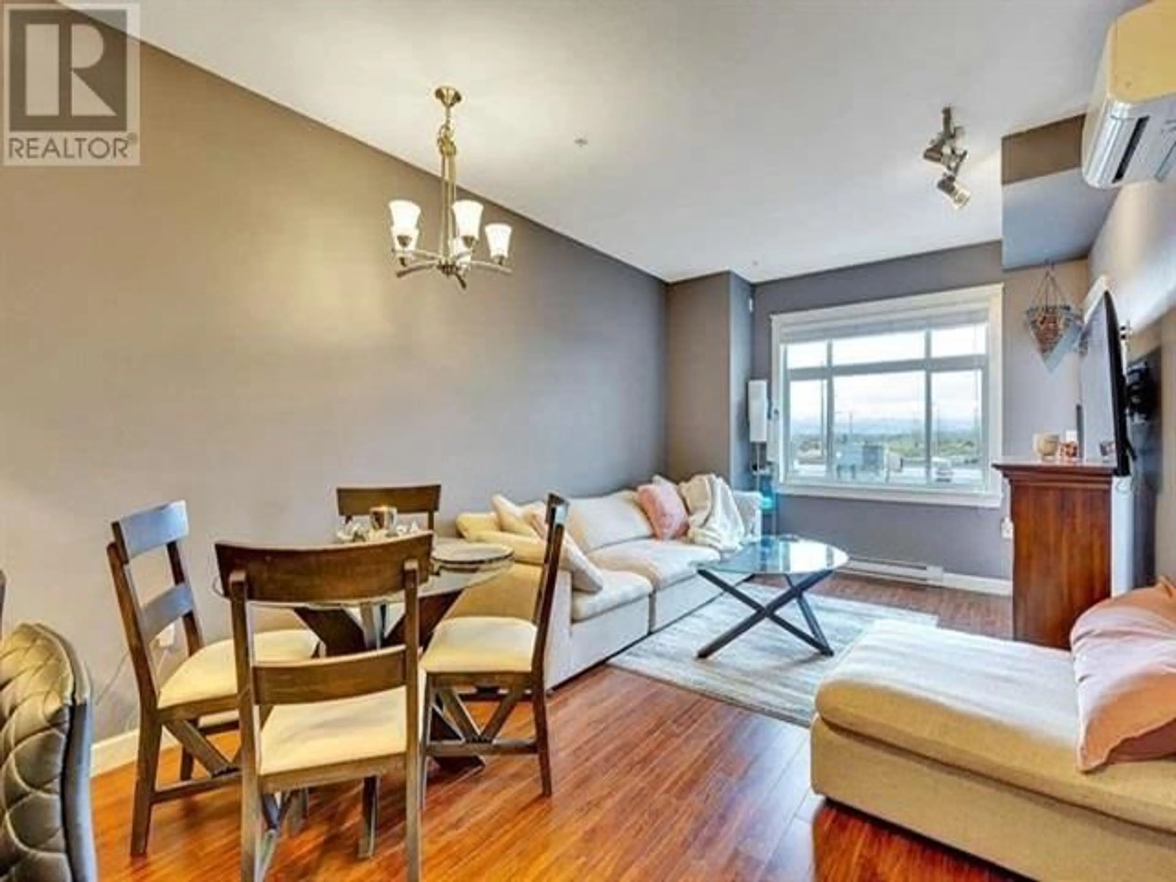 Living room with furniture, wood/laminate floor for 209 12655 190A STREET, Pitt Meadows British Columbia V3Y0E9