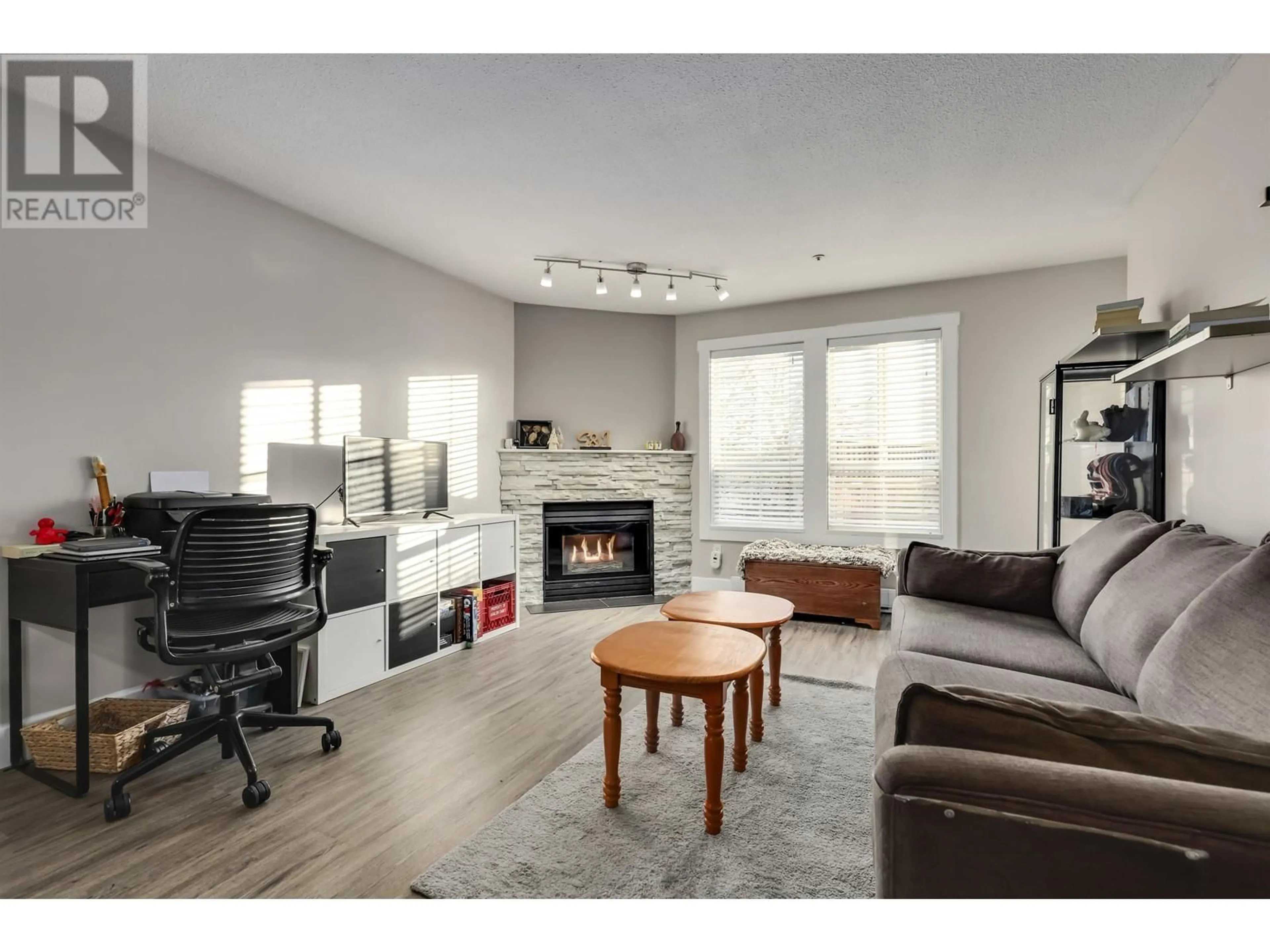 Living room with furniture, wood/laminate floor for 107 295 SCHOOLHOUSE STREET, Coquitlam British Columbia V3R6X5