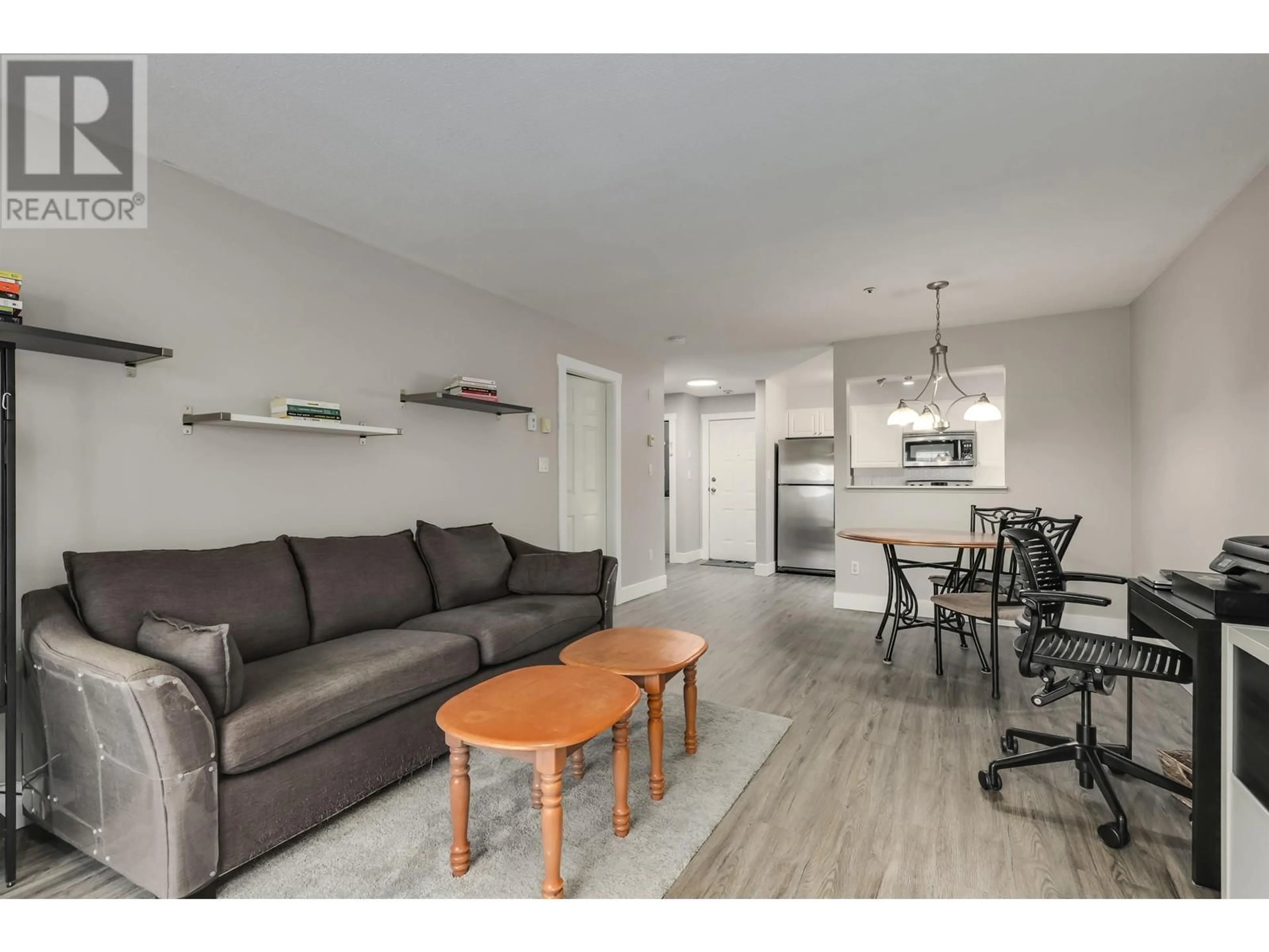 Living room with furniture, wood/laminate floor for 107 295 SCHOOLHOUSE STREET, Coquitlam British Columbia V3R6X5