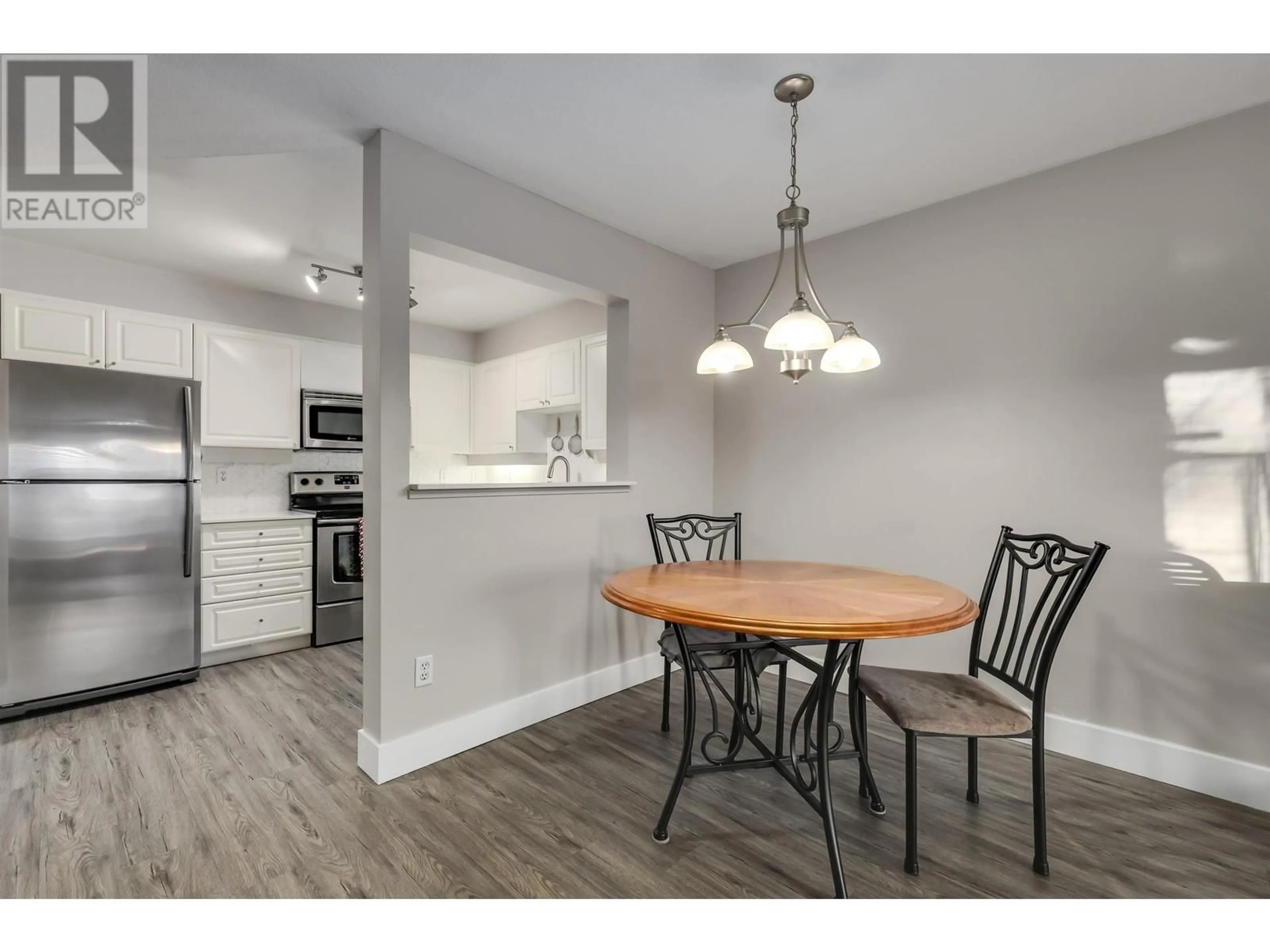 Open concept kitchen, wood/laminate floor for 107 295 SCHOOLHOUSE STREET, Coquitlam British Columbia V3R6X5