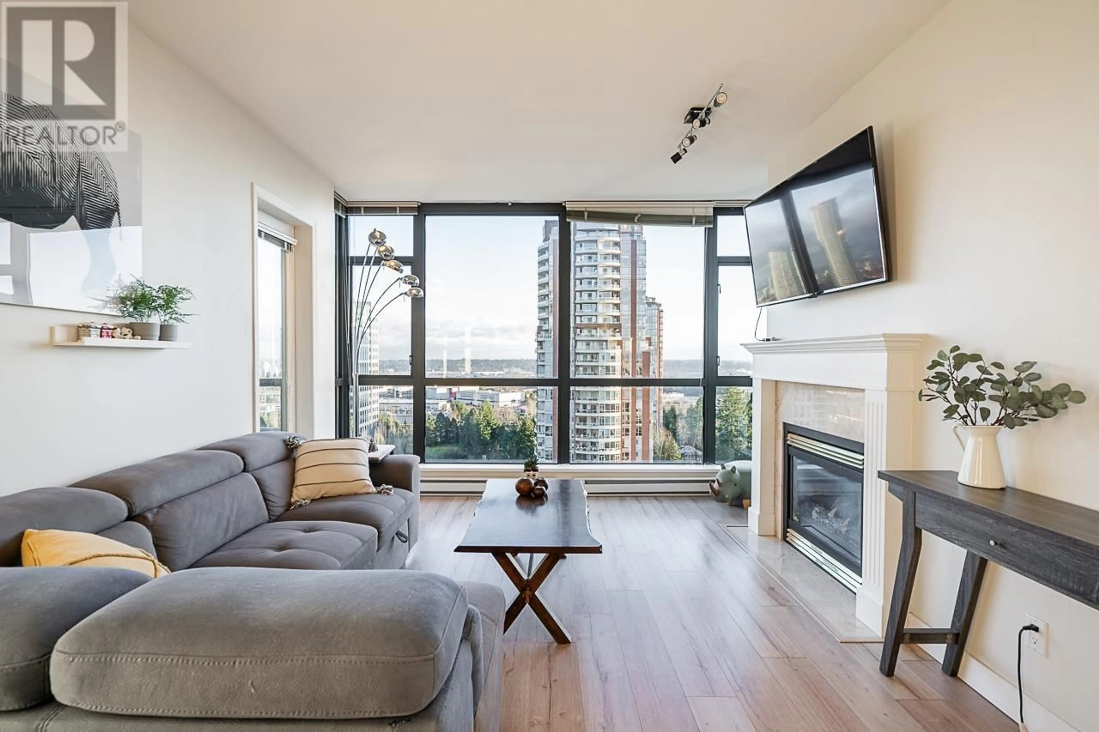 Living room with furniture, wood/laminate floor for 1905 6837 STATION HILL DRIVE, Burnaby British Columbia V3N5B7