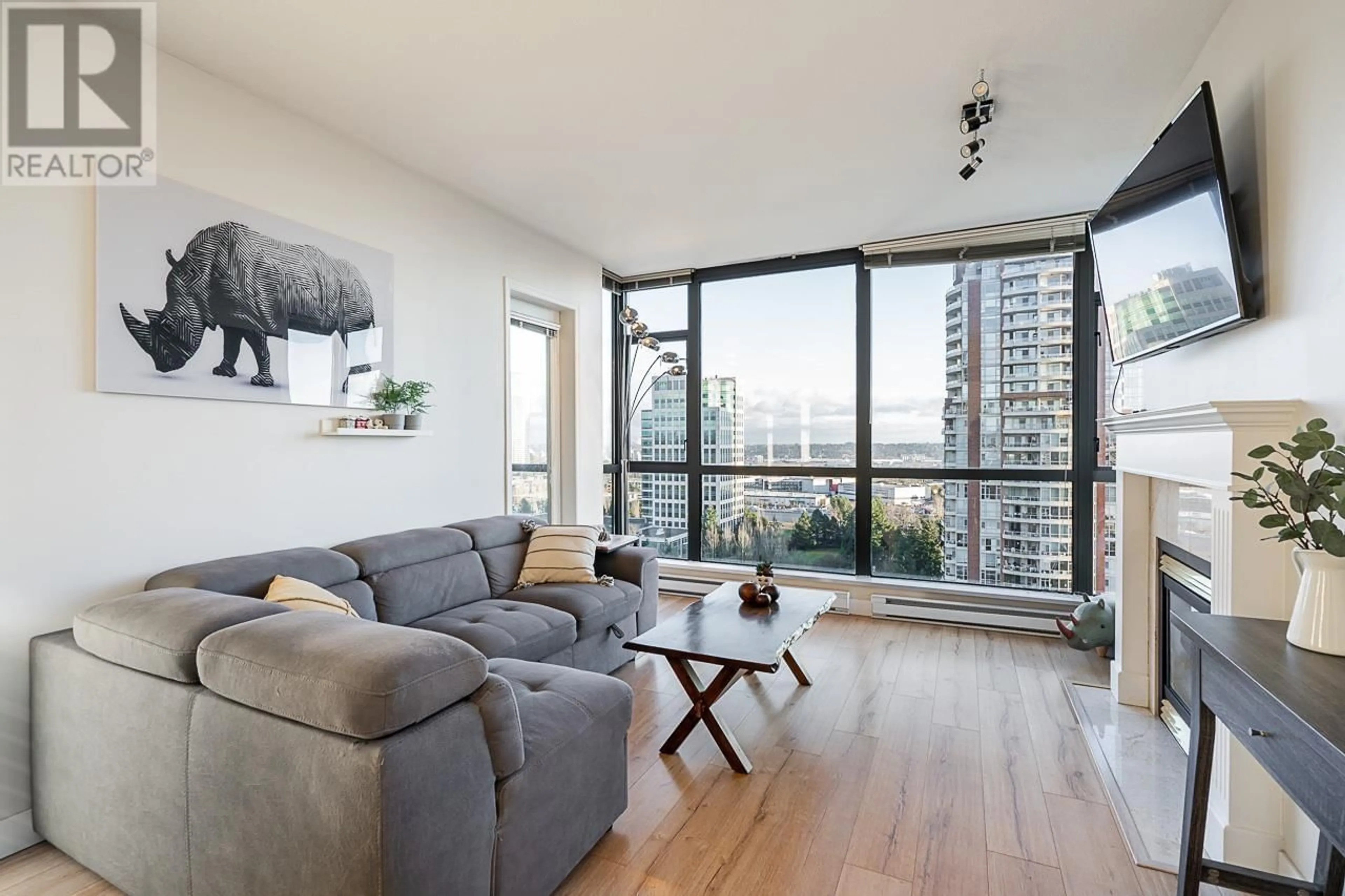 Living room with furniture, wood/laminate floor for 1905 6837 STATION HILL DRIVE, Burnaby British Columbia V3N5B7