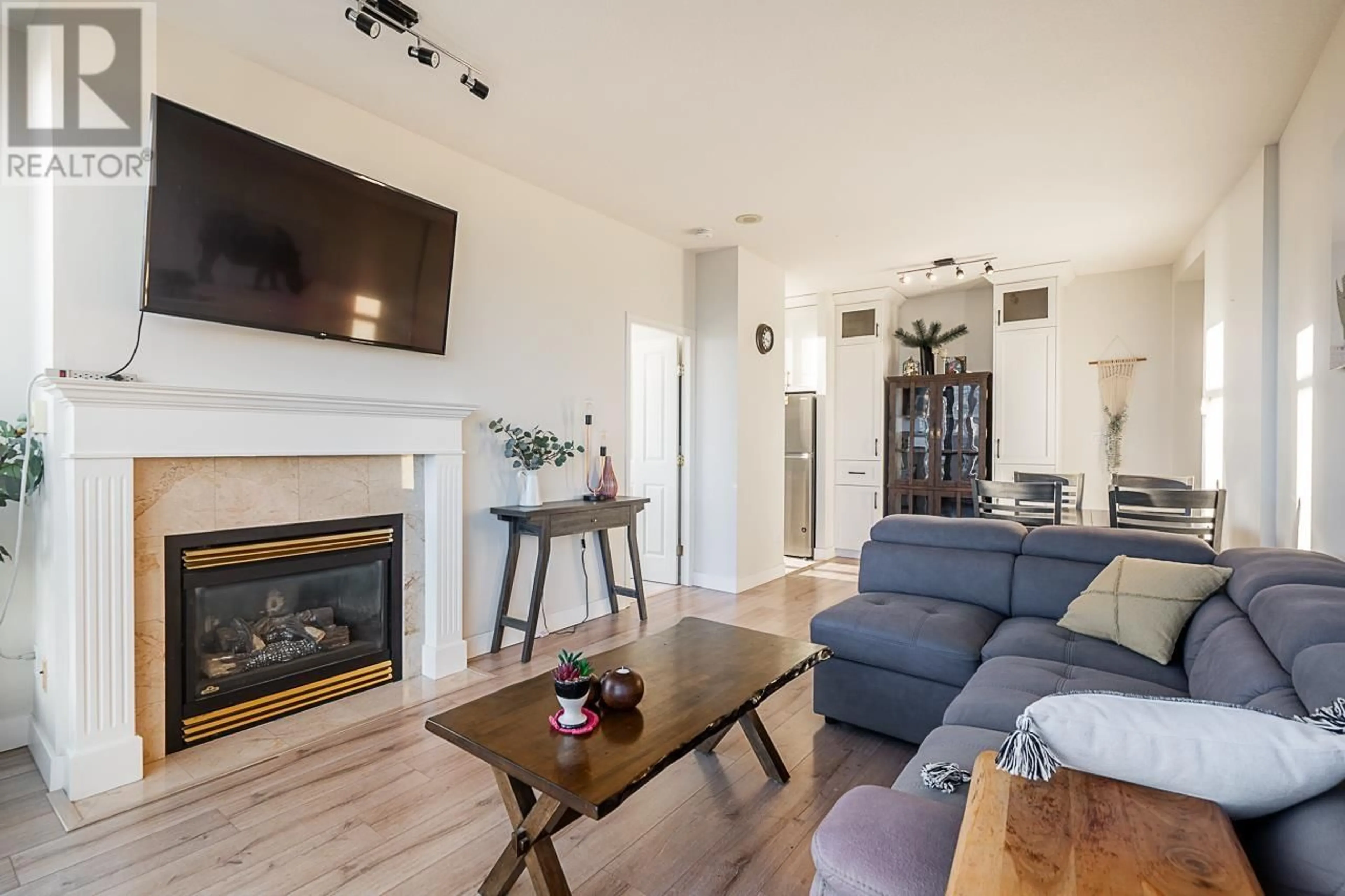 Living room with furniture, wood/laminate floor for 1905 6837 STATION HILL DRIVE, Burnaby British Columbia V3N5B7