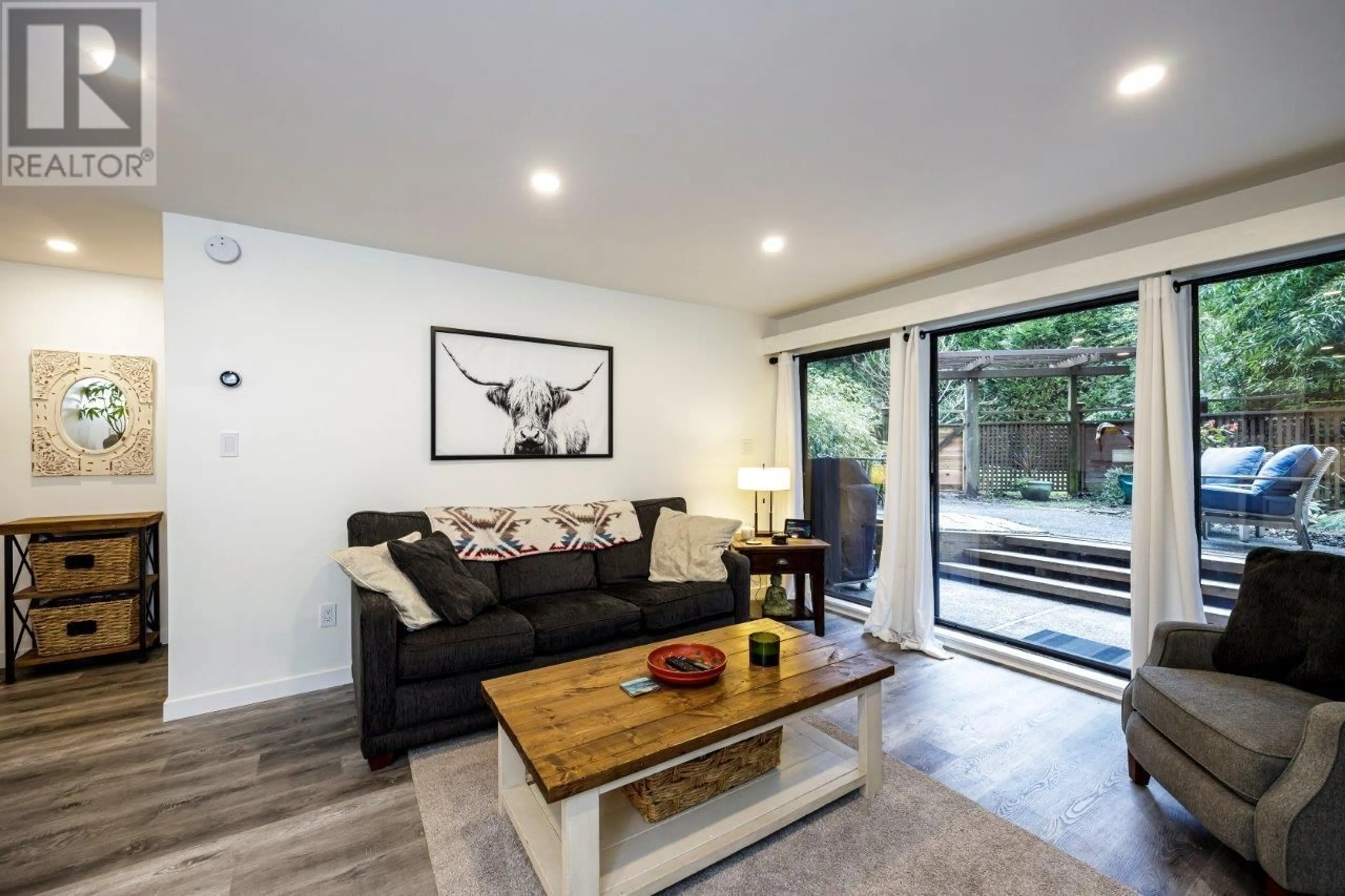 Living room with furniture, wood/laminate floor for 121 1945 WOODWAY PLACE, Burnaby British Columbia V5B4S4