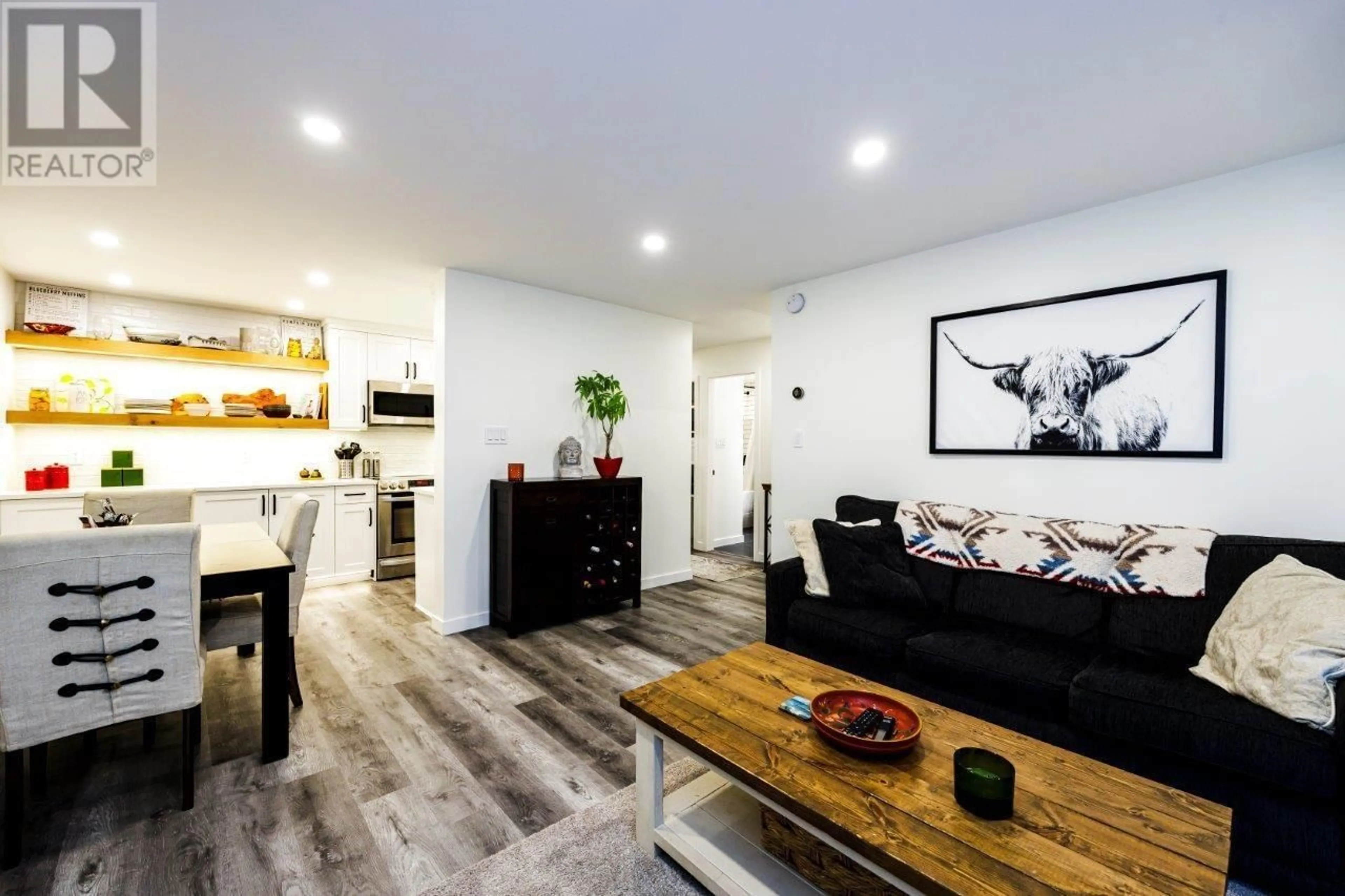 Living room with furniture, wood/laminate floor for 121 1945 WOODWAY PLACE, Burnaby British Columbia V5B4S4