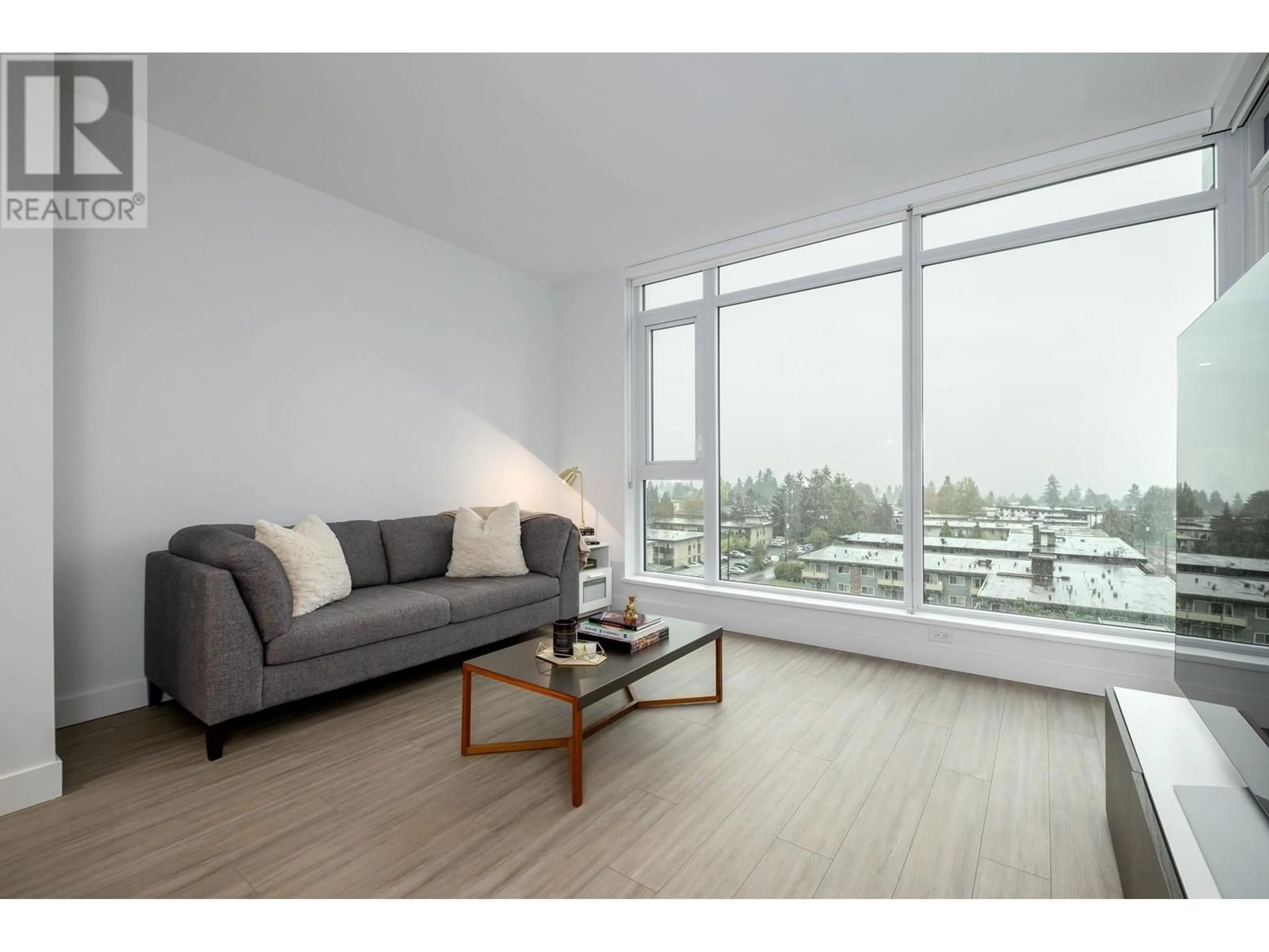 Living room with furniture, wood/laminate floor for 802 6398 SILVER AVENUE, Burnaby British Columbia V5H0K7